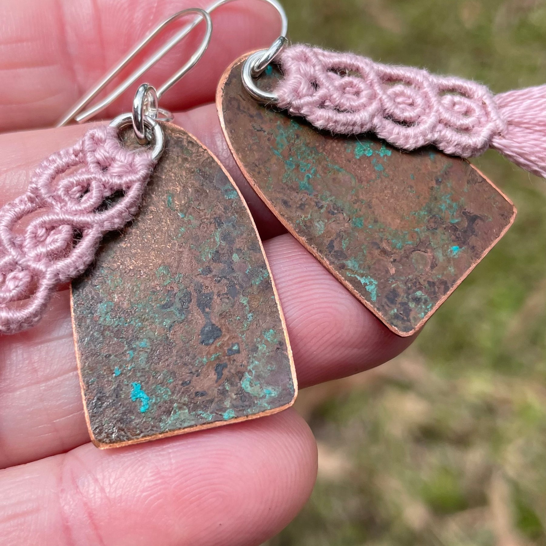 Pink macrame thread on patinated copper