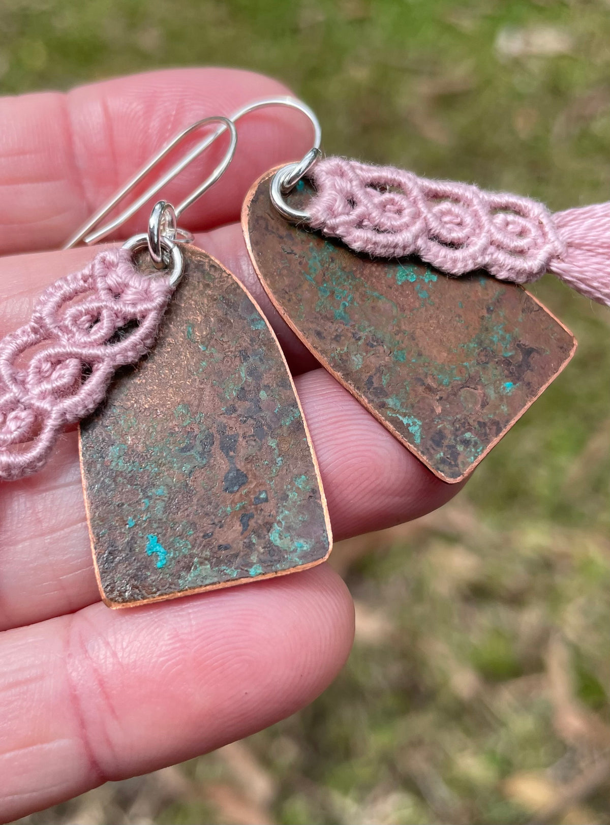 Pink macrame thread on patinated copper