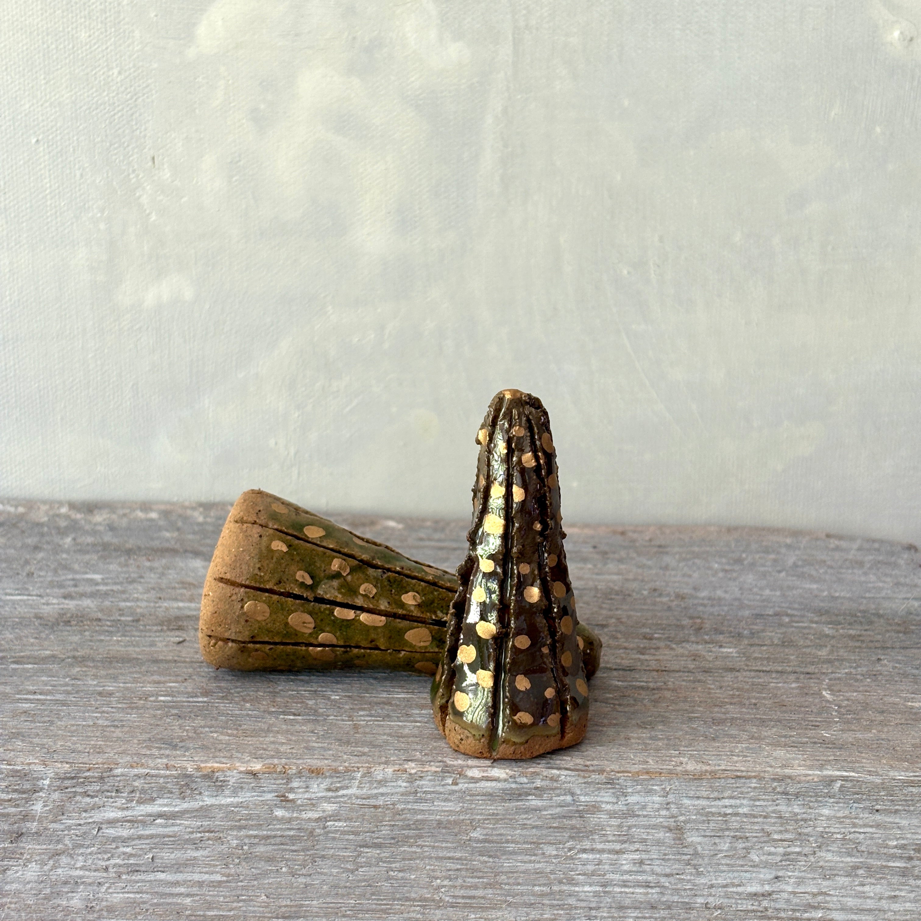 Two small ceramic Christmas Trees in green with Gold