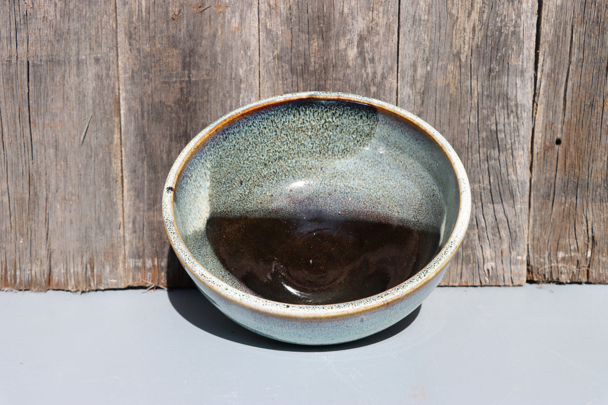 Stoneware bowls hand made with white speckled chun glaze over teadust brown.
