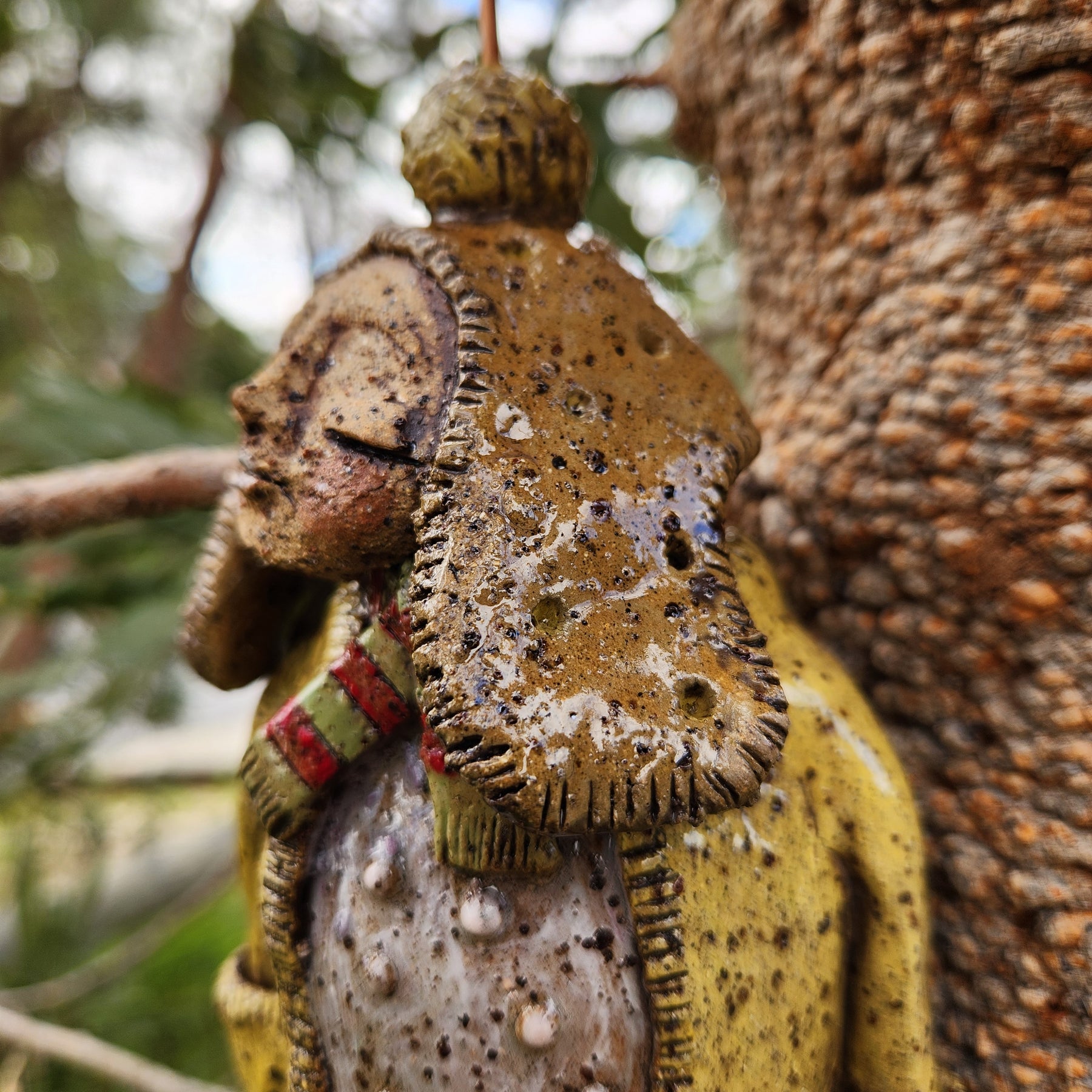 Handmade clay windchime, little girl