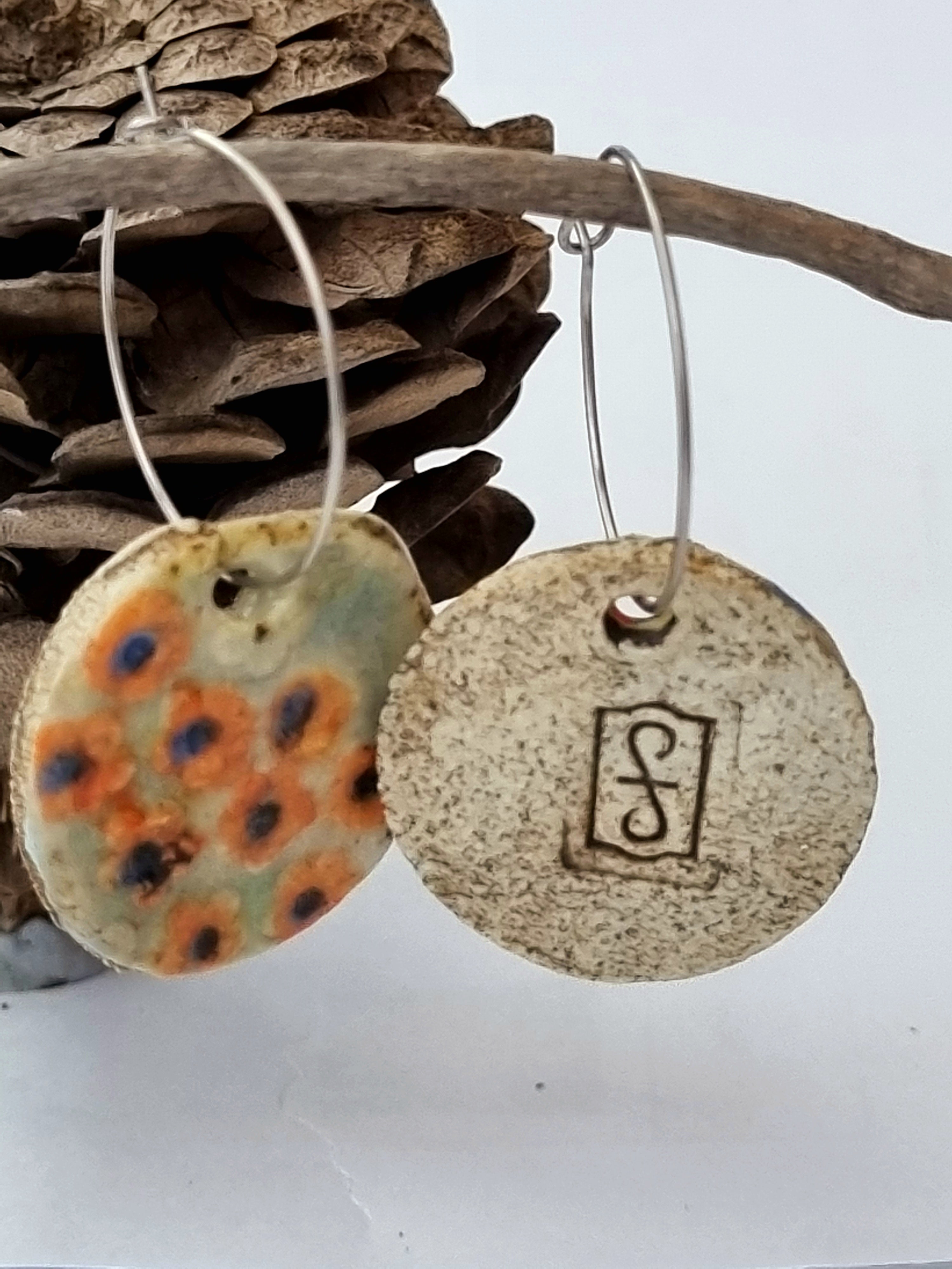 Handmade Stoneware Ceramic Earrings, orange floral multi-coloured, 28mm diameter, pierced ears