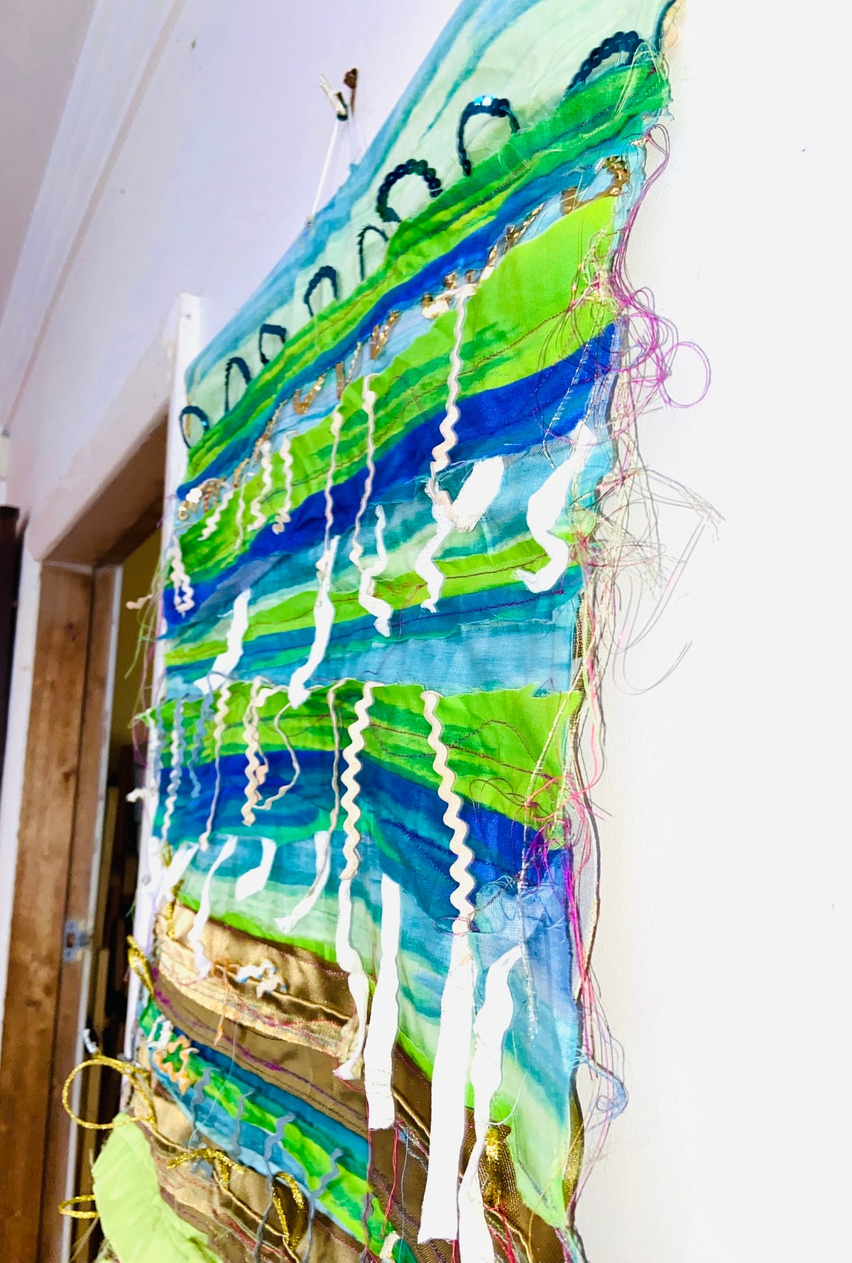 Green, Blue and Gold textile wall hanging