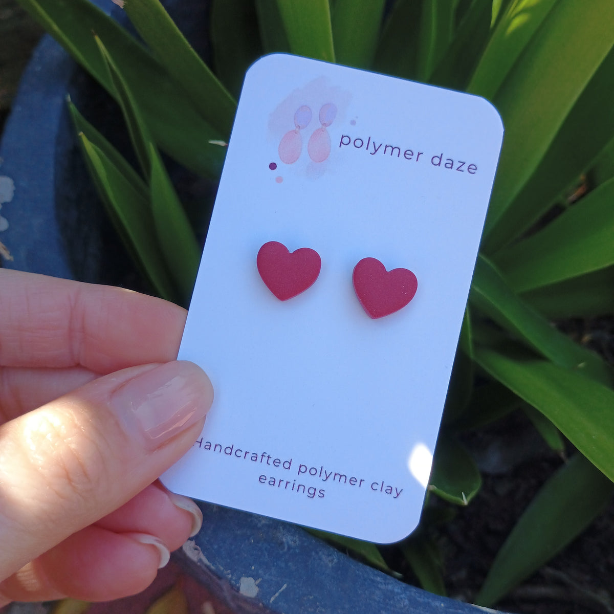 Burgundy hearts stud earrings