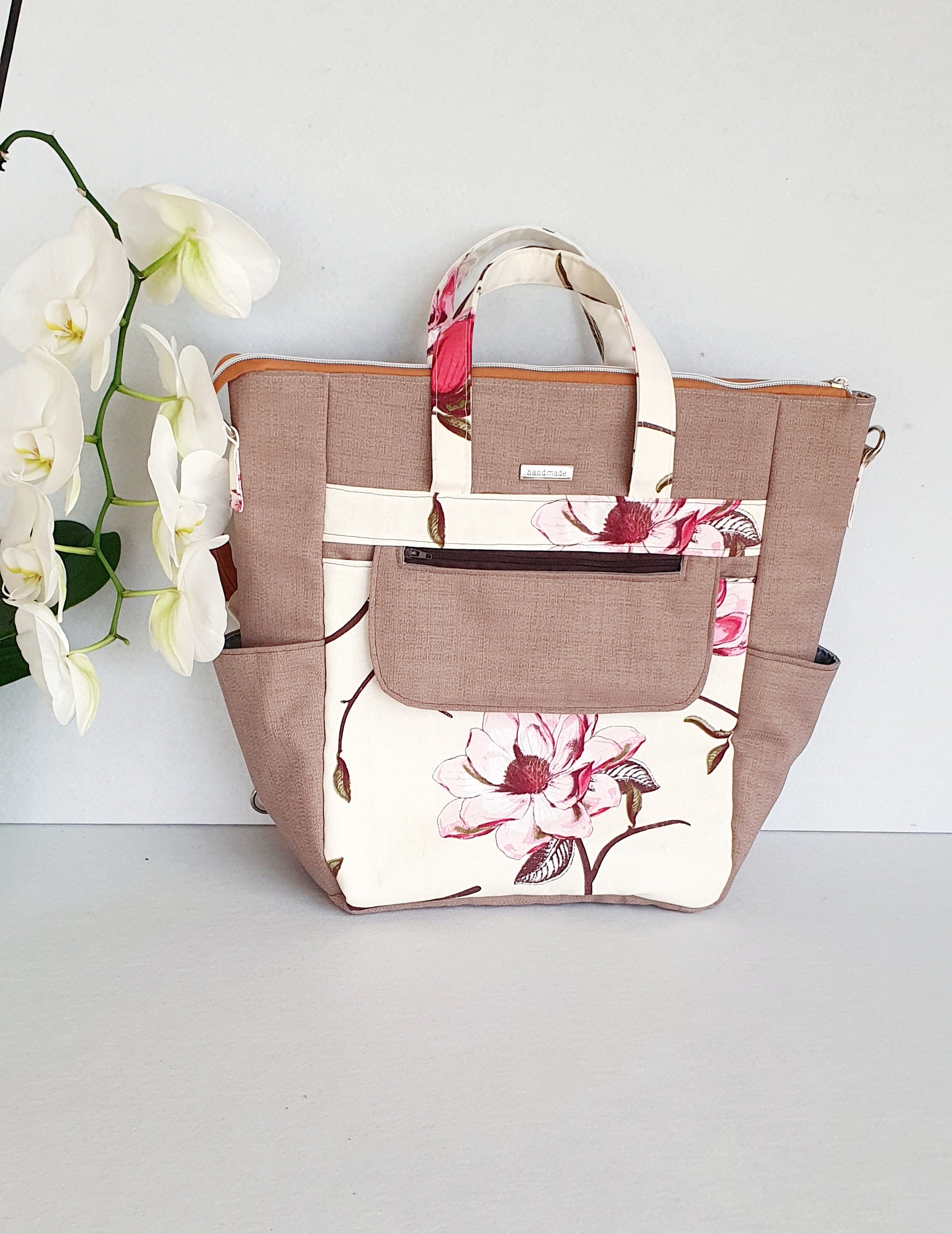 Magnolia Blossom modern bag converting from handbag into crossbody or backpack
