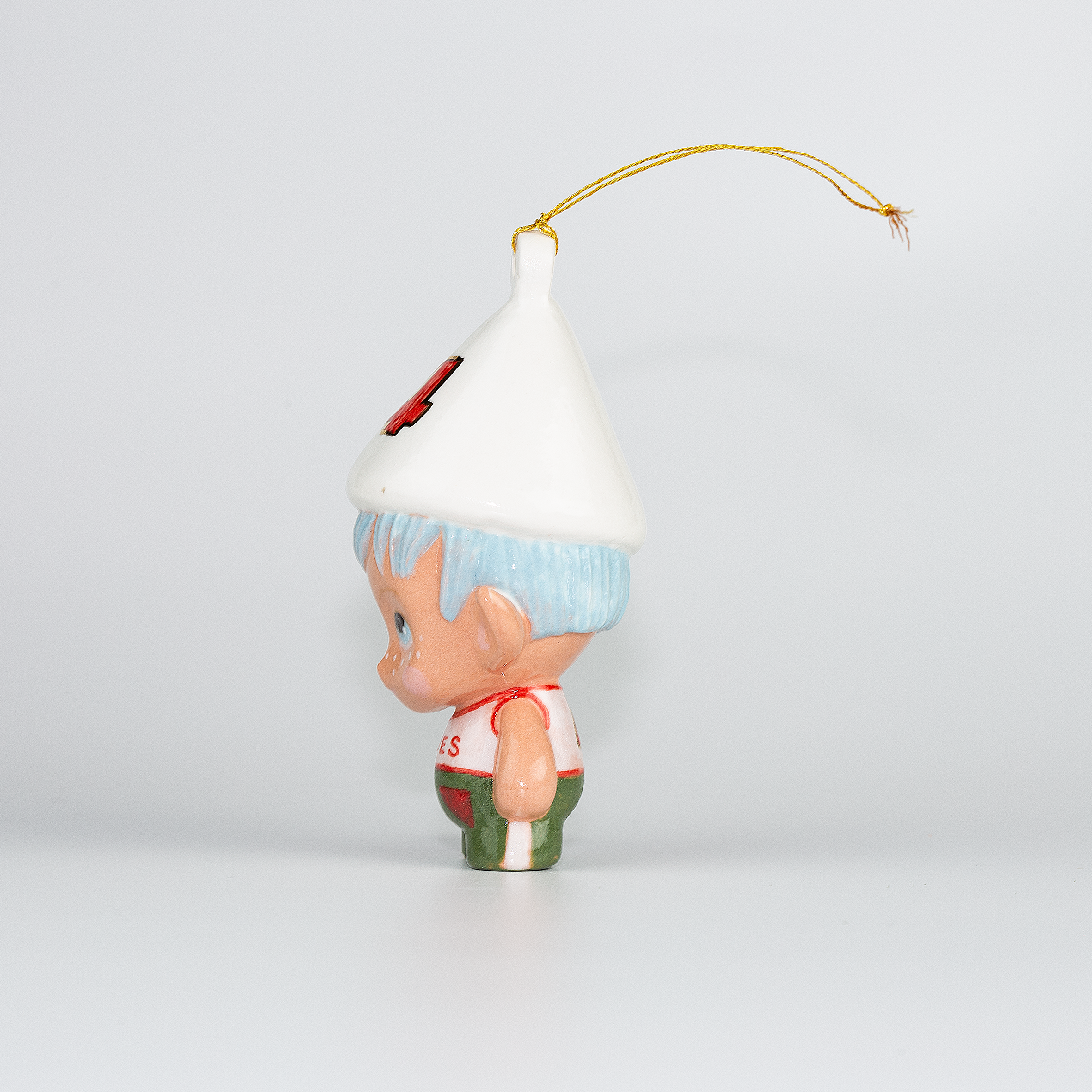 Handmade Porcelain Christmas ornament. One-of-a-kind. Kade the footy Elf.