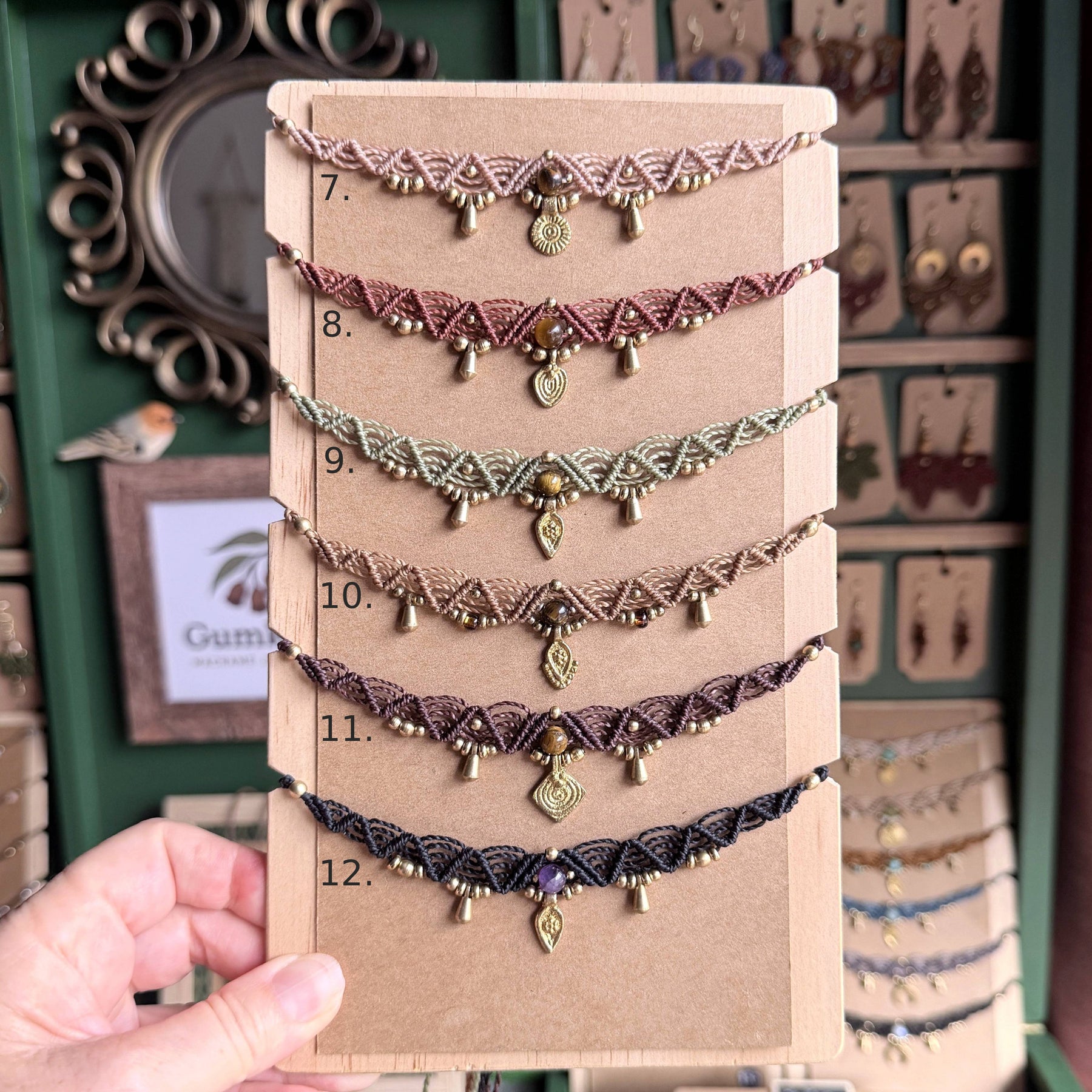 Macrame Boho Collier with gemstone bead and brass charms.