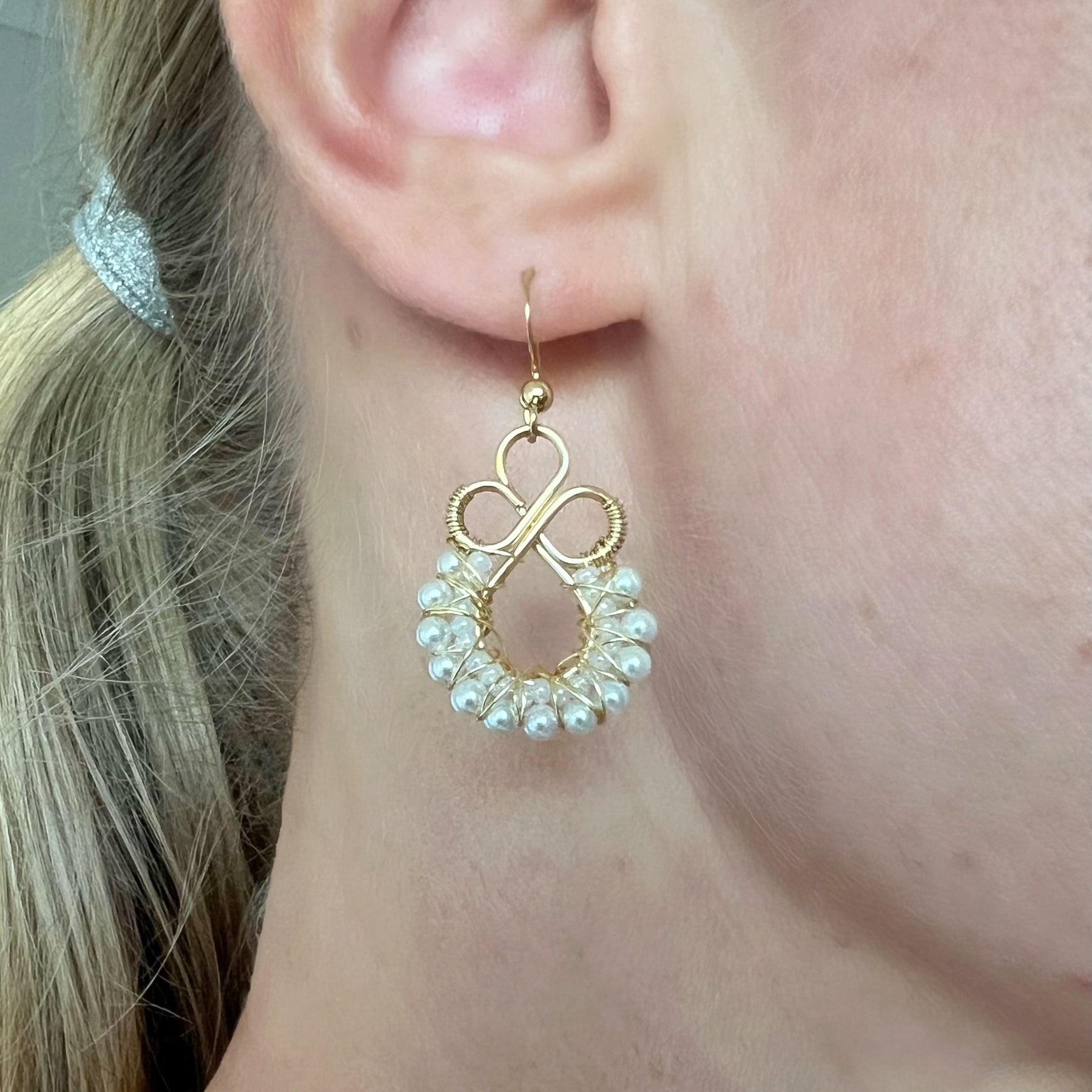 Gold wire wrapped earrings with shell based peals and Czech seee beads