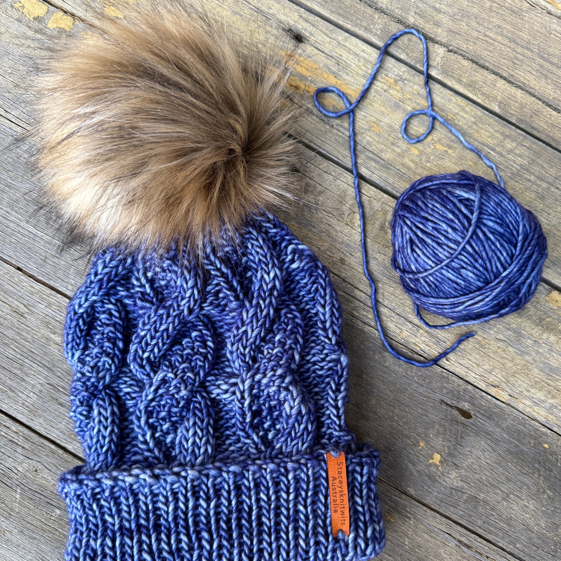 Hand knitted blue merino beanie, unisex cable PomPom beanie