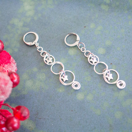 Silver Looped Earrings With Twinkling Stars