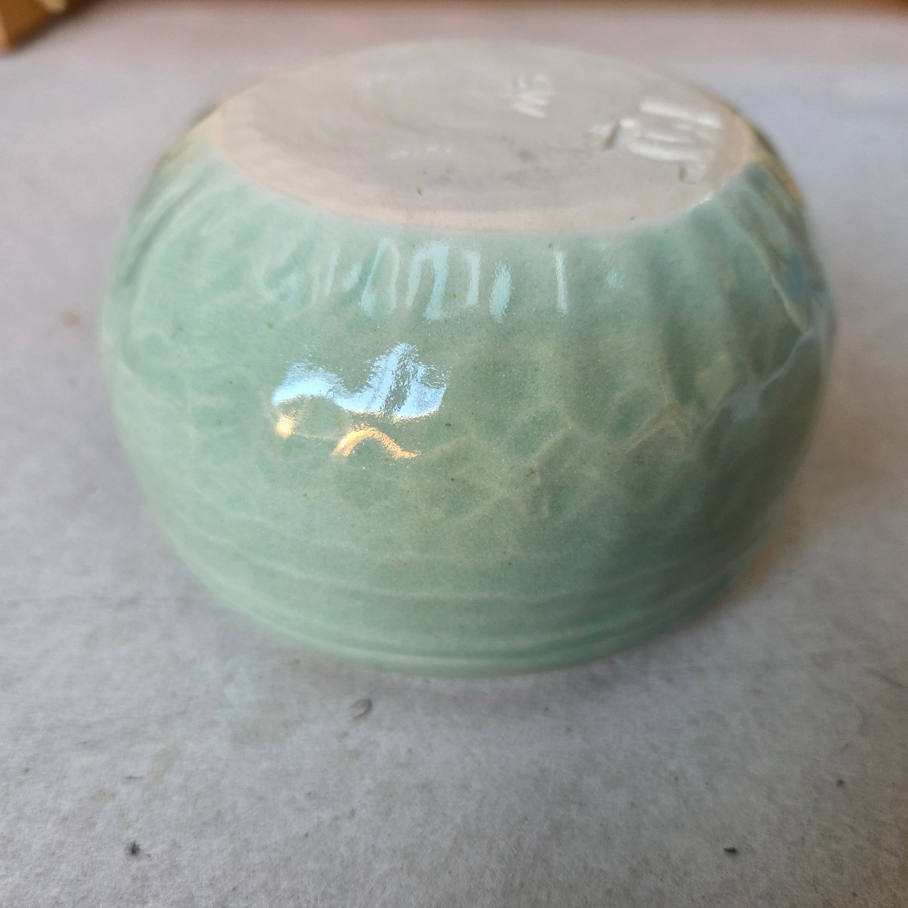 8 x 6.5cm  moon bowl in wheel thrown stoneware clay. Fully glazed