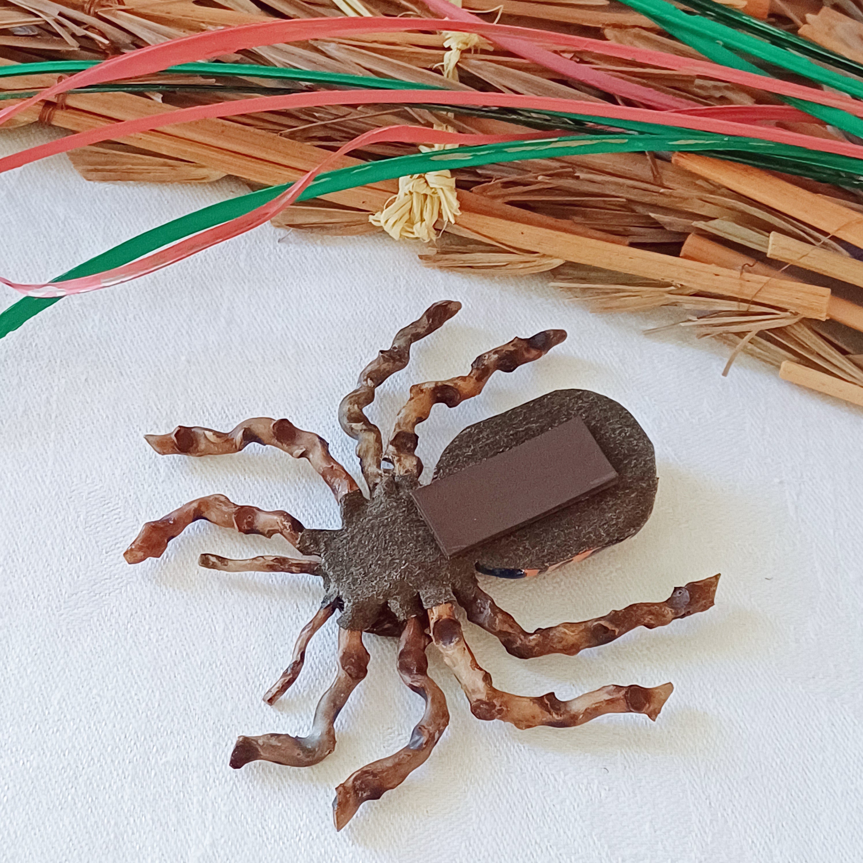 Hand painted blue palm leaf clay spider keepsake with magnet