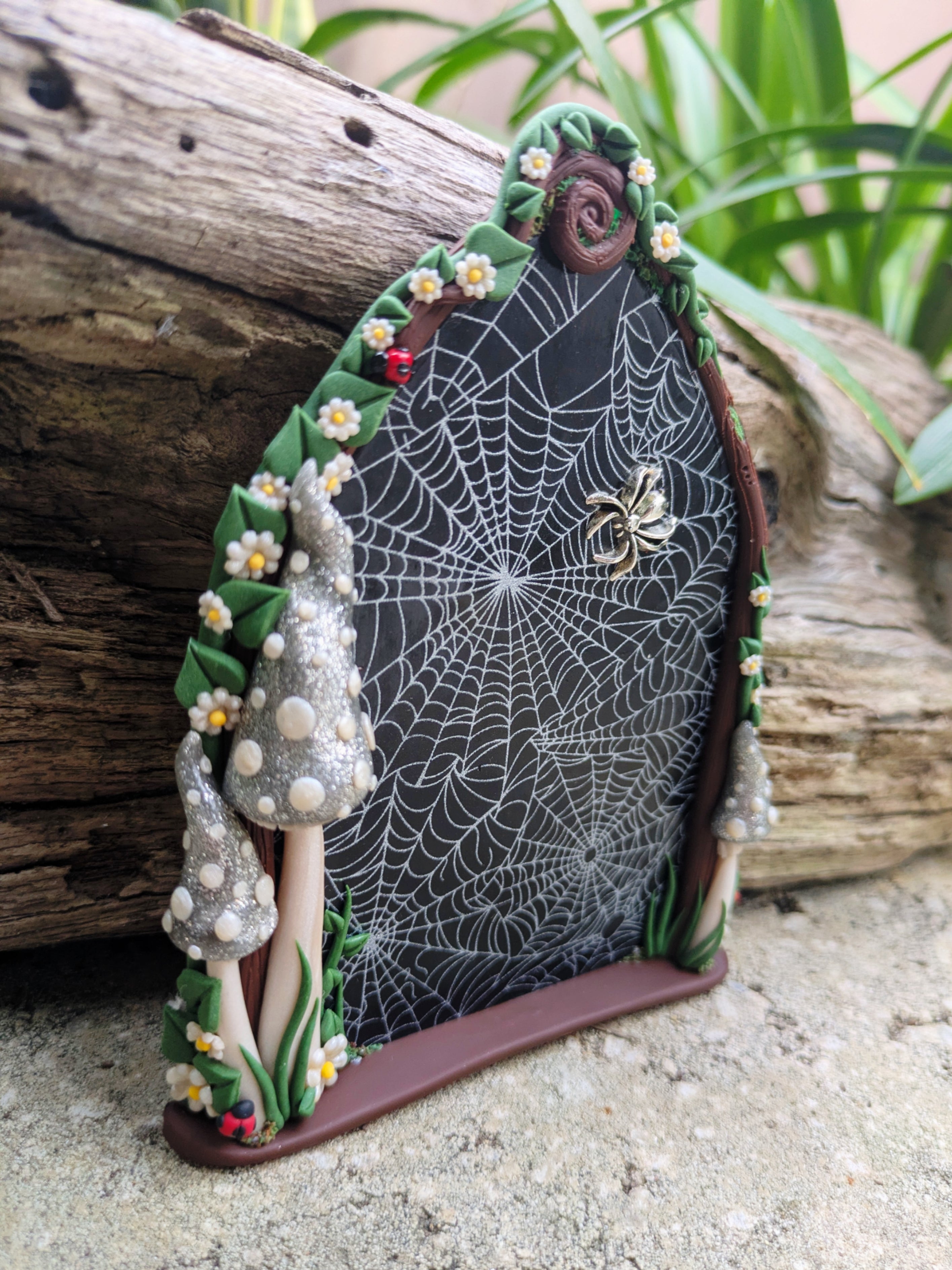 Spiderweb Forest Fairy door with glow in the dark mushrooms