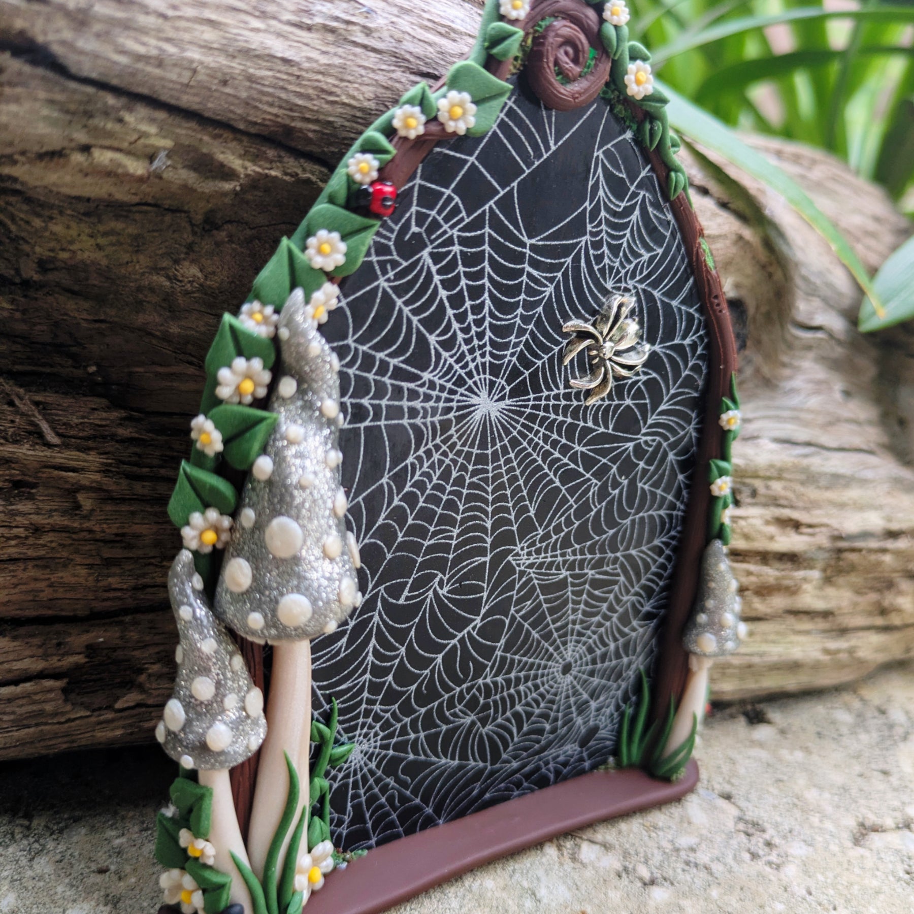 Spiderweb Forest Fairy door with glow in the dark mushrooms