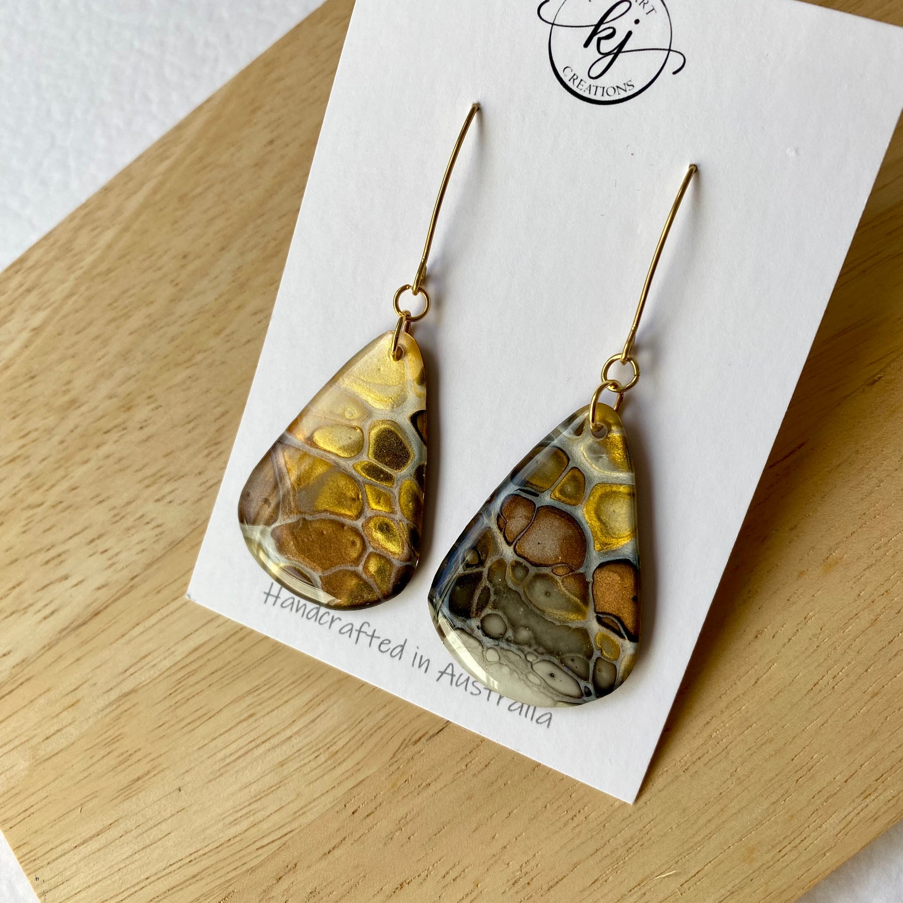 Artisan unmatched Painted Earrings