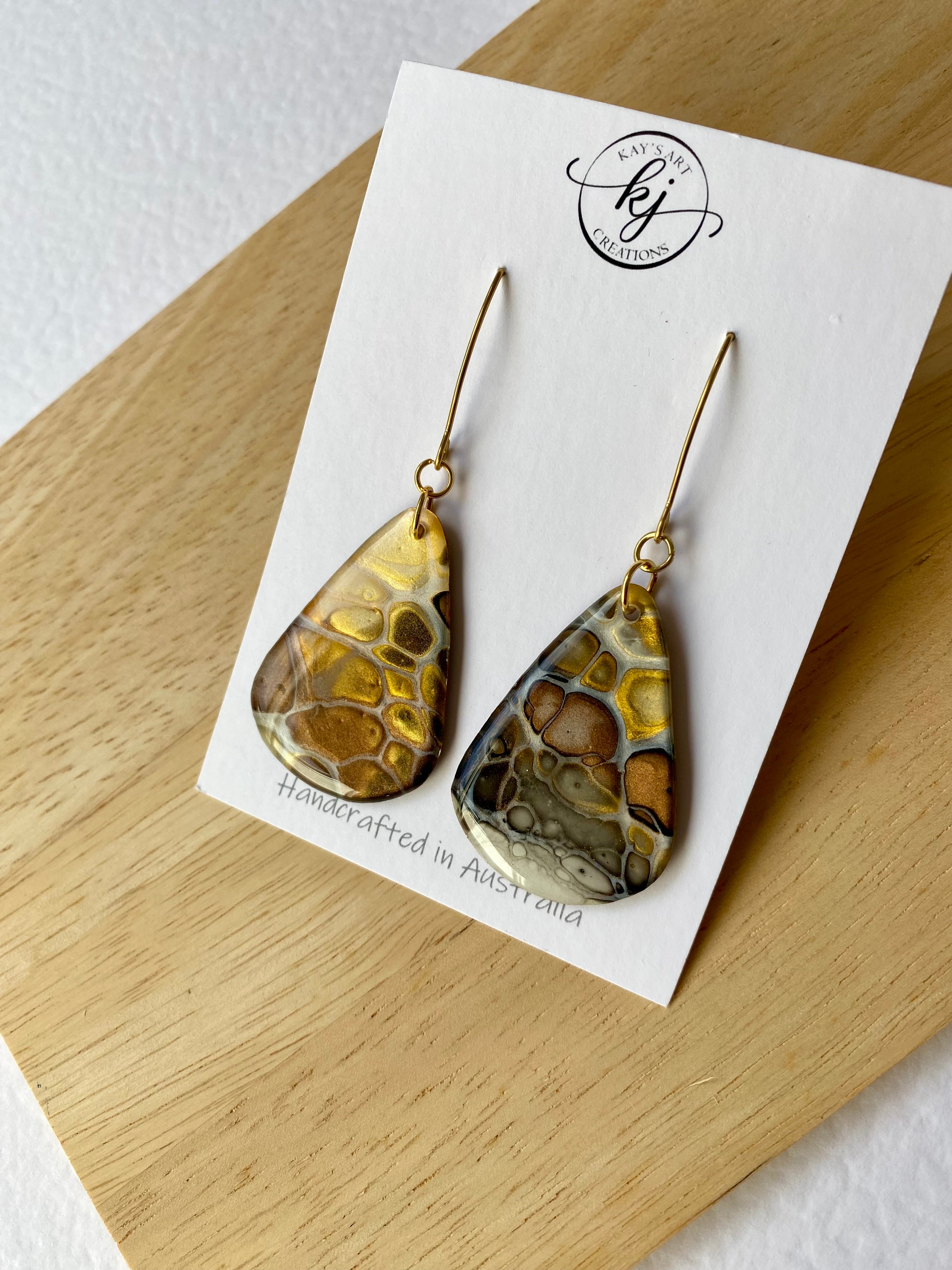Artisan unmatched Painted Earrings