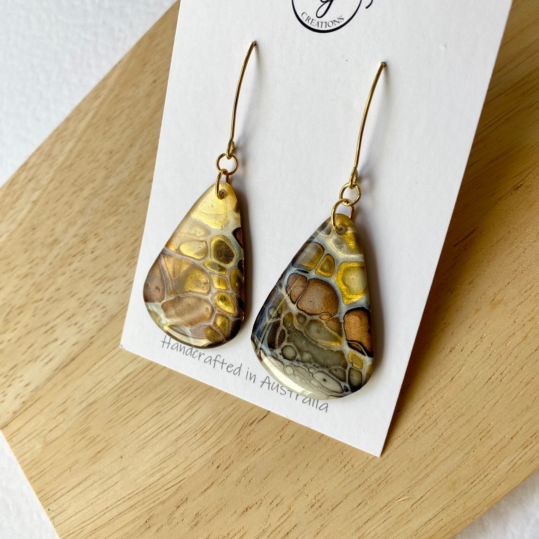 Artisan unmatched Painted Earrings