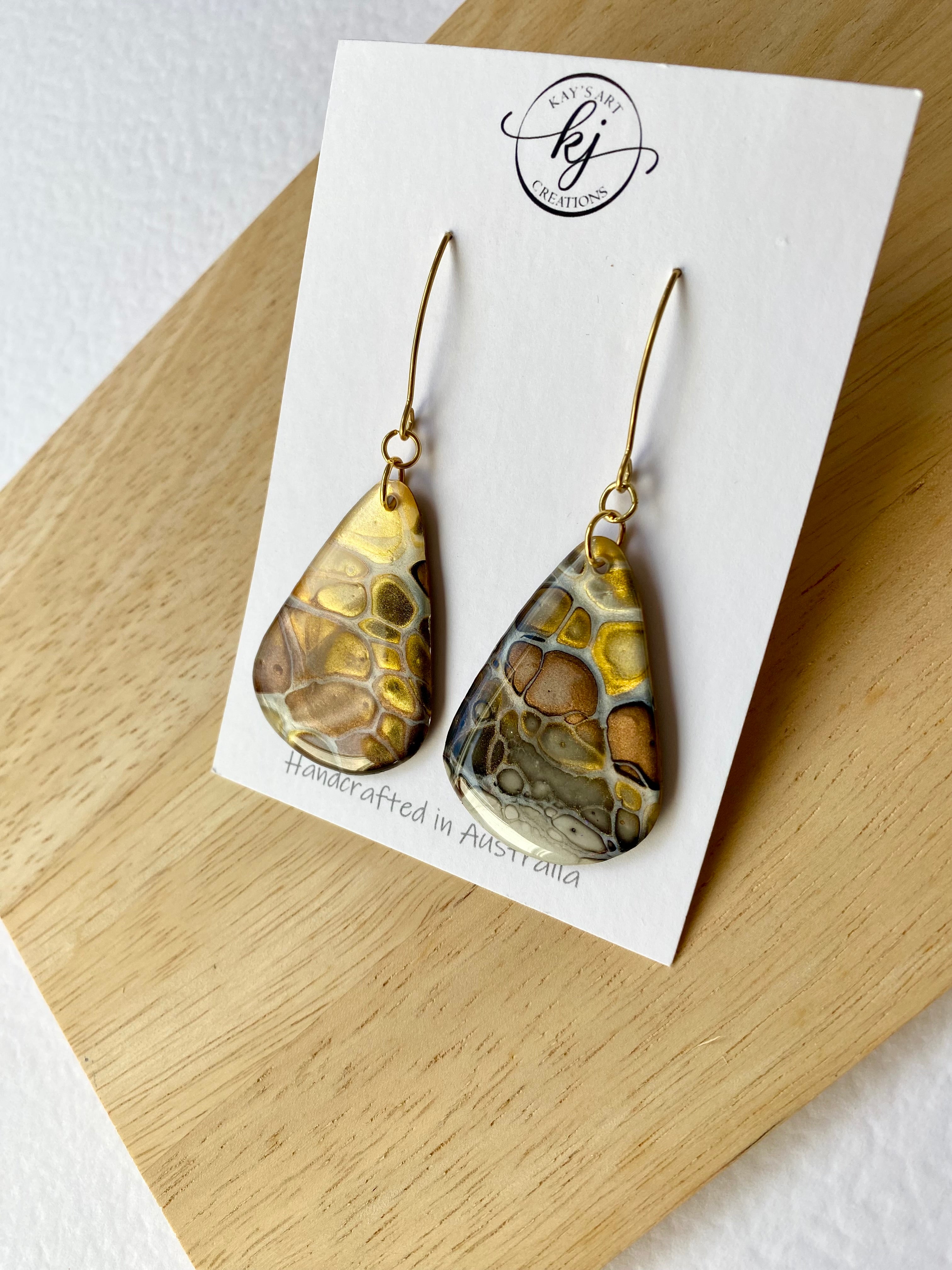 Artisan unmatched Painted Earrings