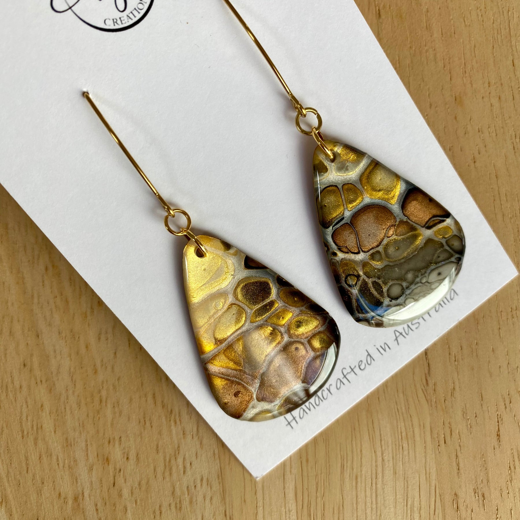 Artisan unmatched Painted Earrings