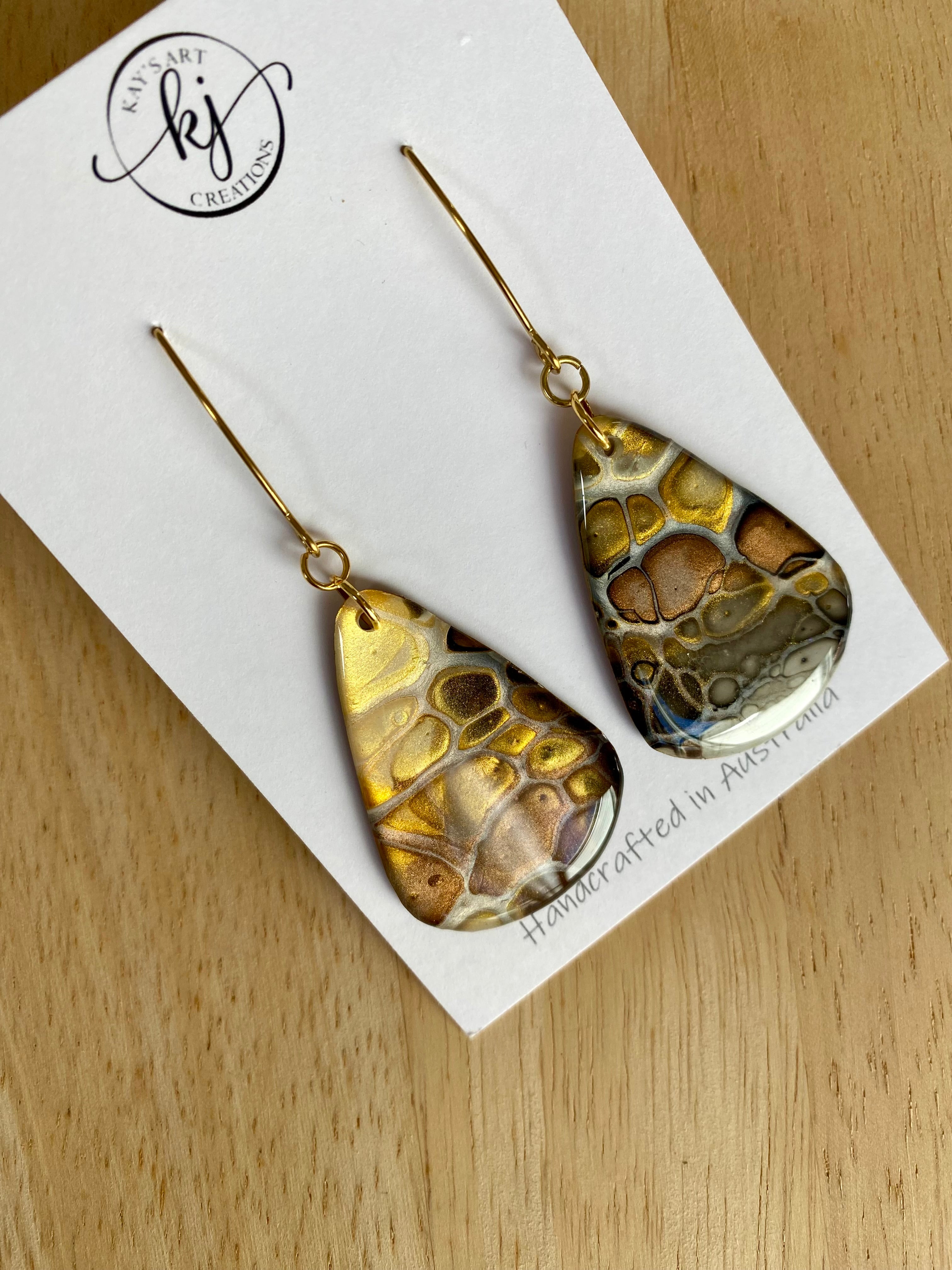 Artisan unmatched Painted Earrings