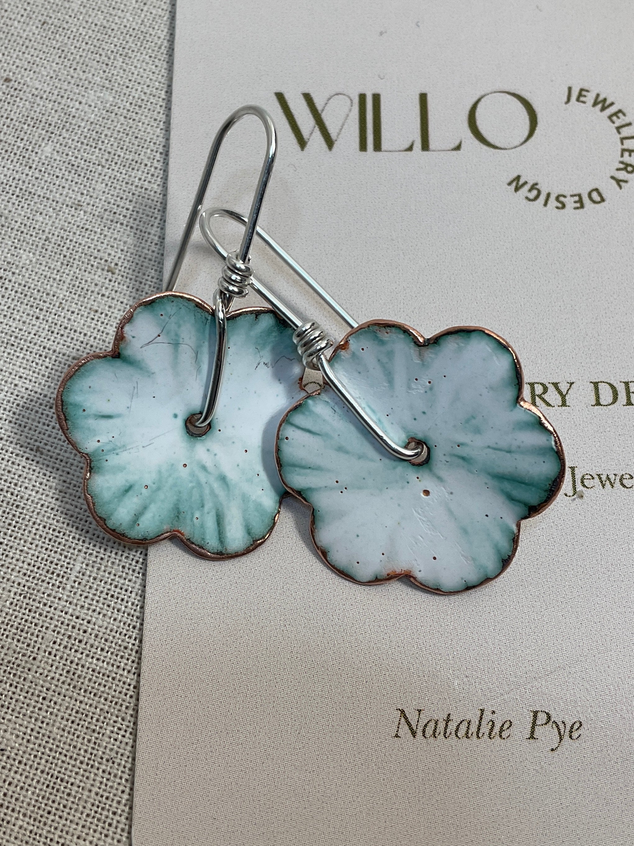 Teal and white flowers. Enamel earrings