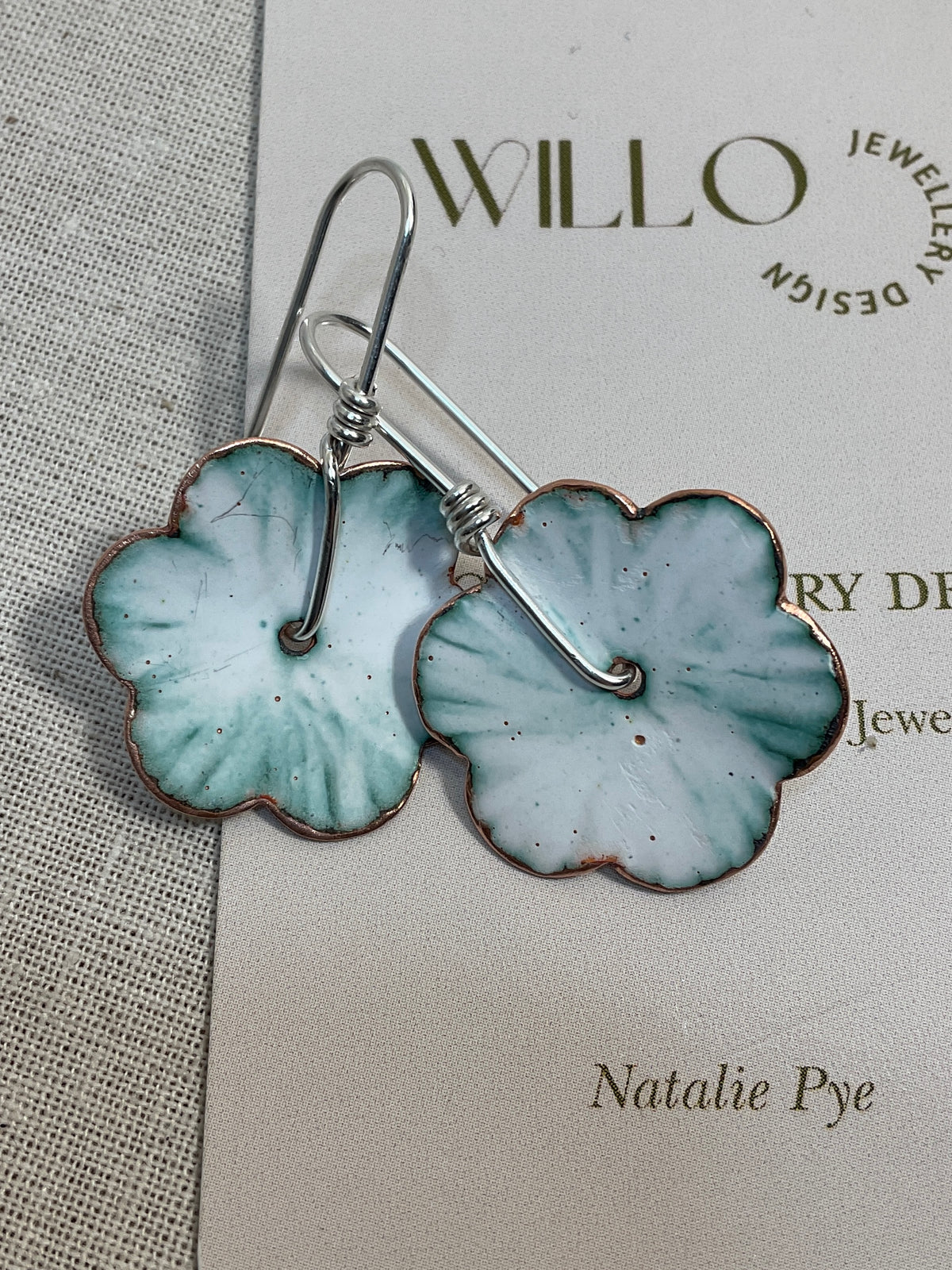 Teal and white flowers. Enamel earrings