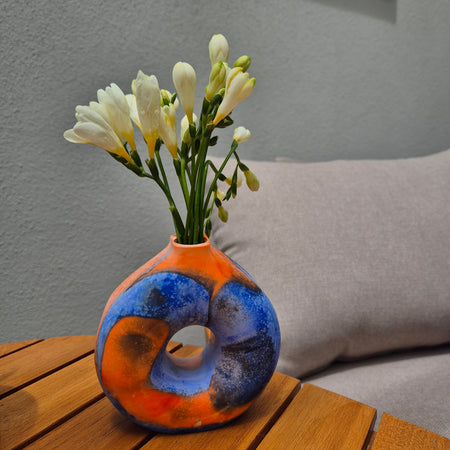 Blue and orange eco-concrete donut vase