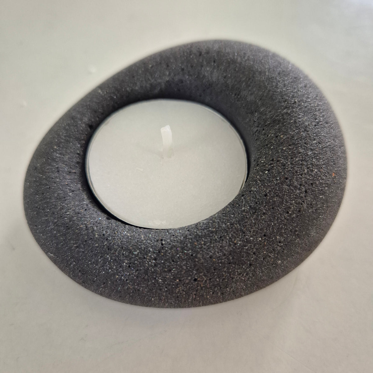 Black eco-stone pebble shaped tealight candle holder