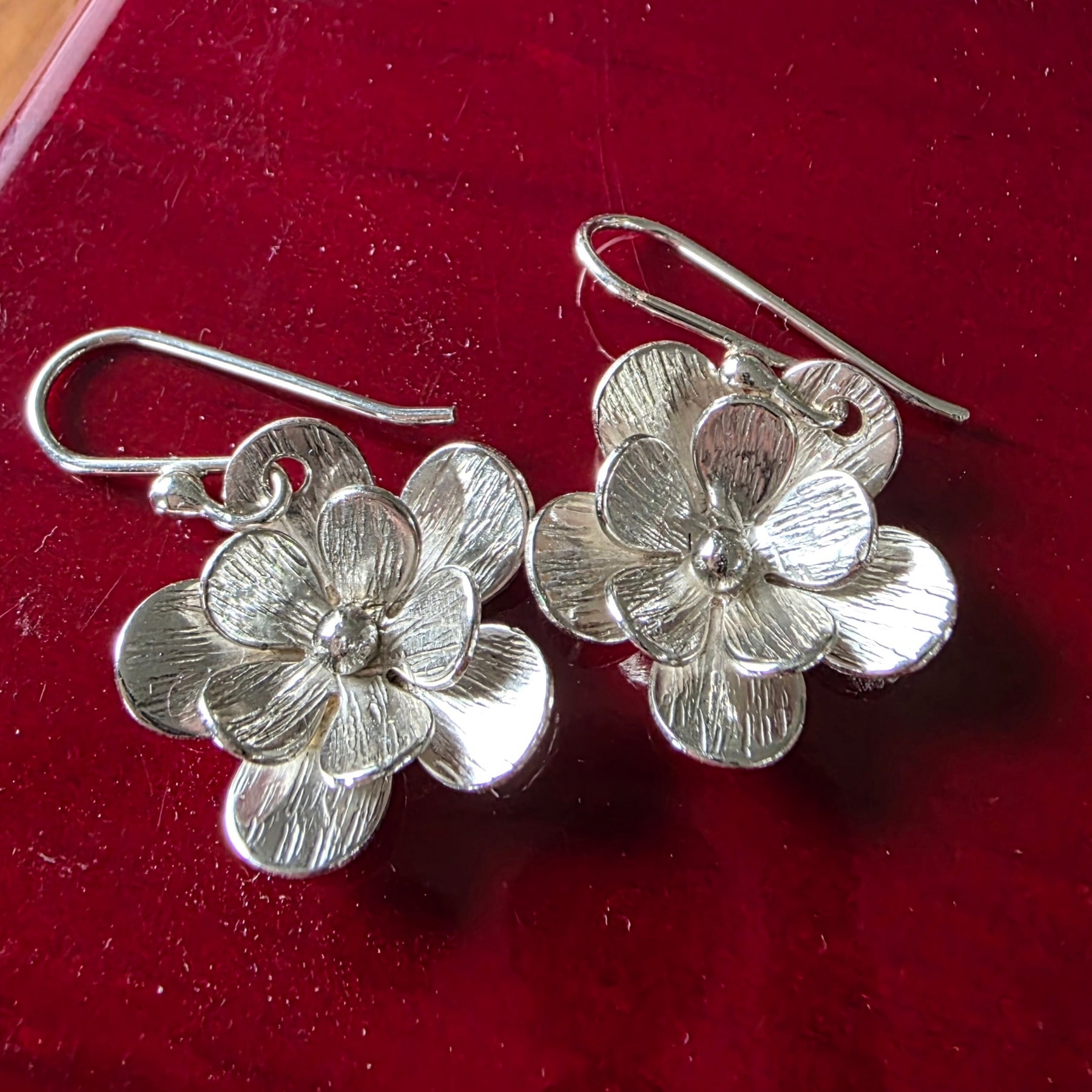 Dainty sterling silver textured flower earrings