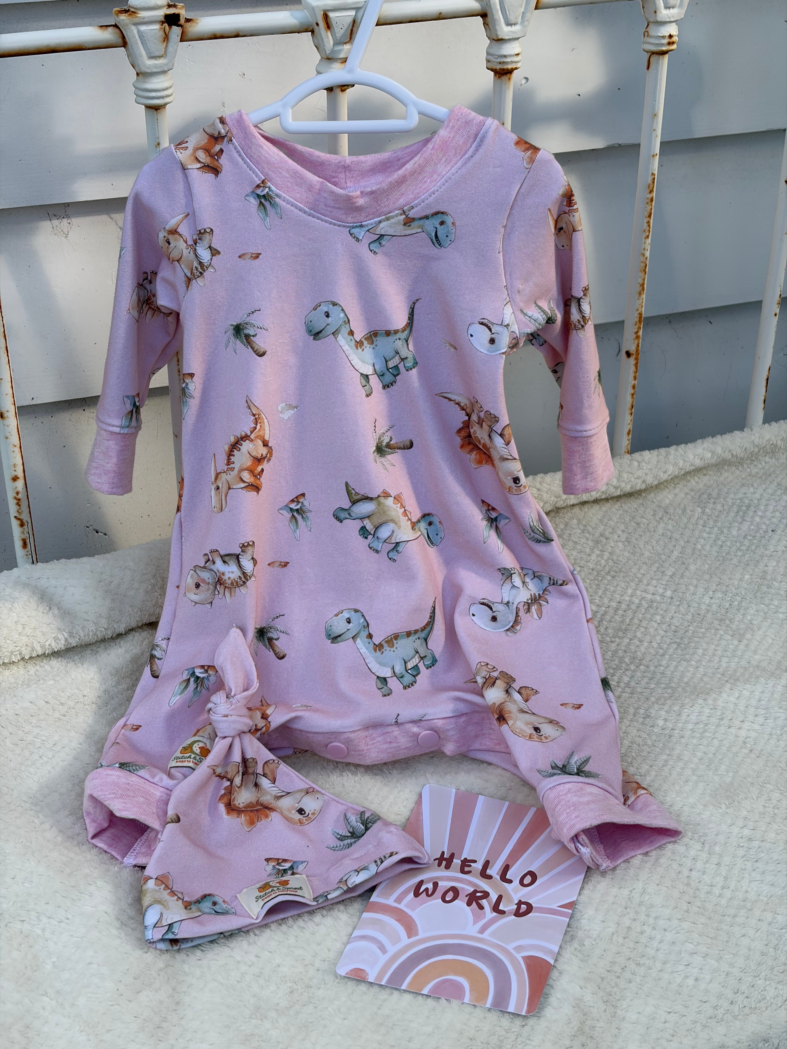 PINK DINOSAUR ROMPER 0-3 months