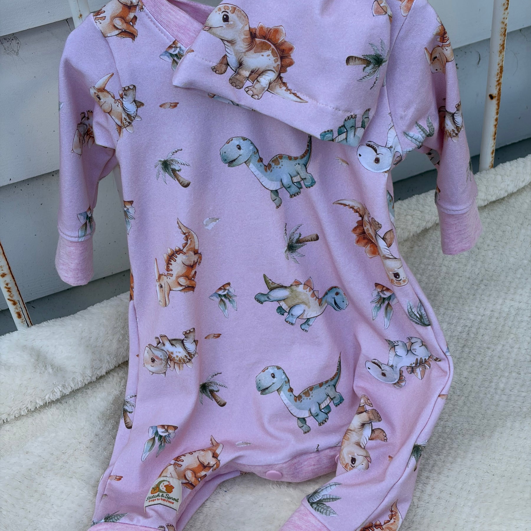 PINK DINOSAUR ROMPER 0-3 months