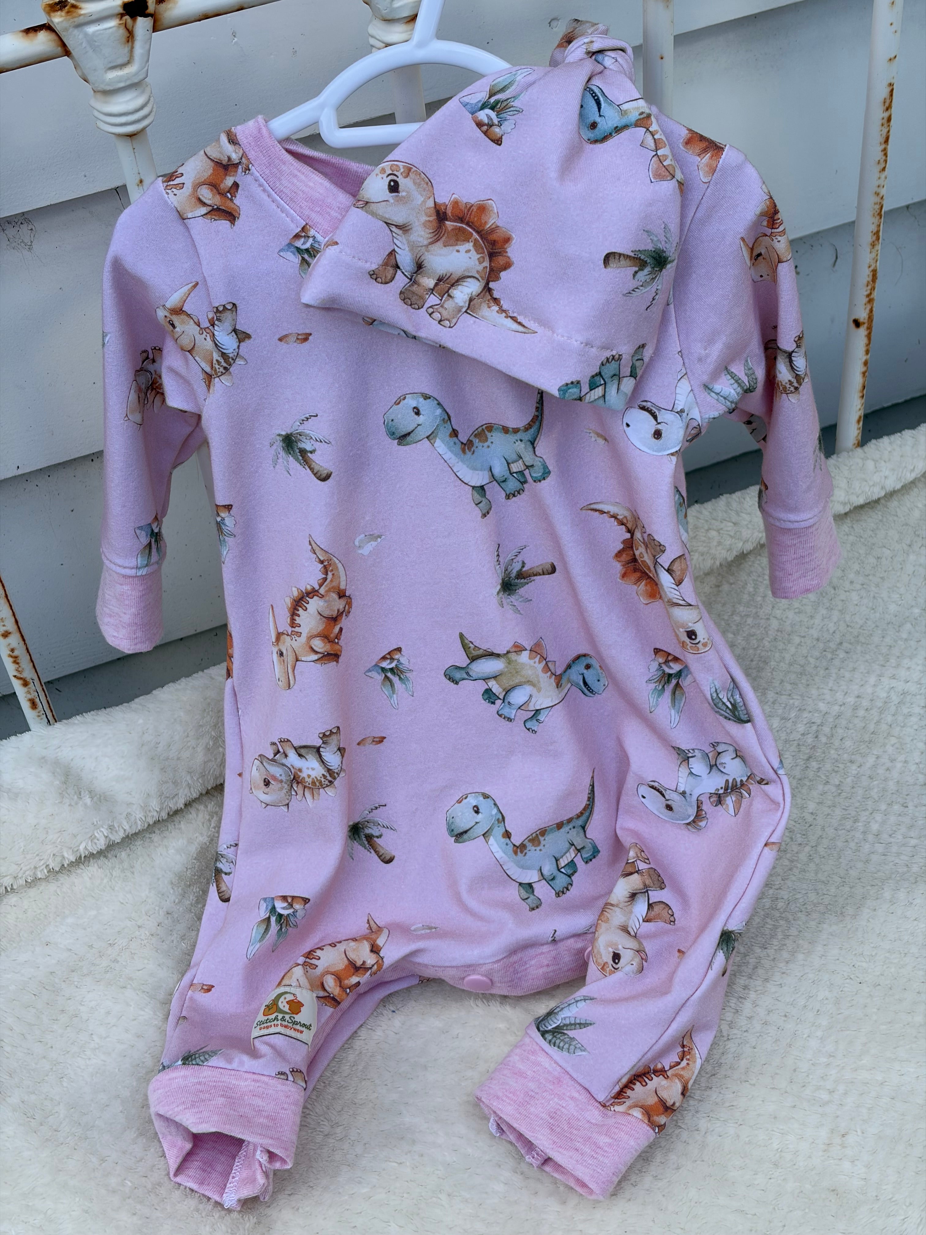 PINK DINOSAUR ROMPER 0-3 months