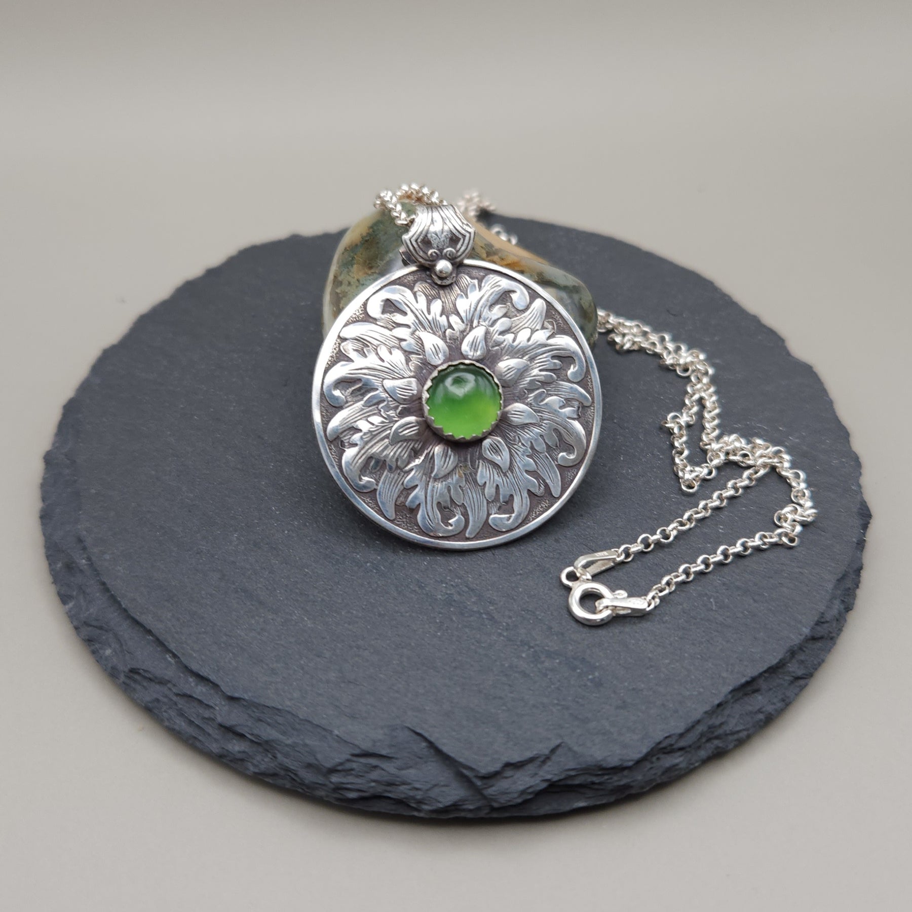 Leafy medallion with serpentine