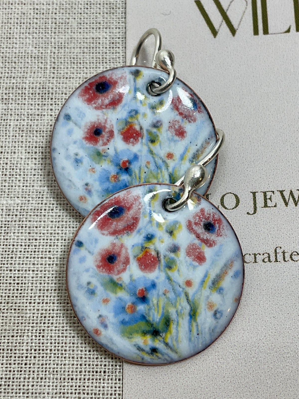 Red poppy design enamel earrings. Handmade