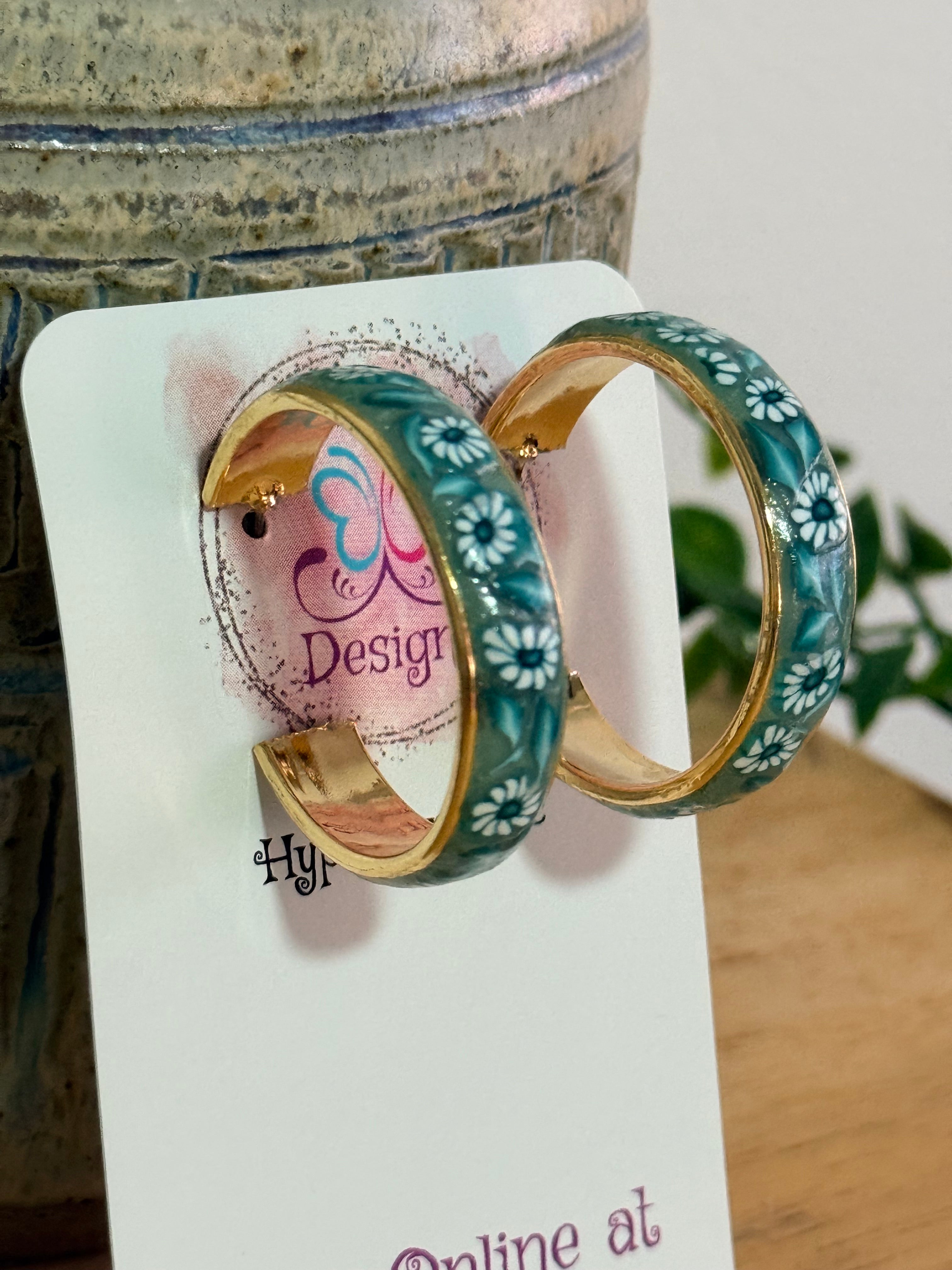 Teal Polymer Clay Daisies & Leaves On Gold Plated Hoop Earrings.