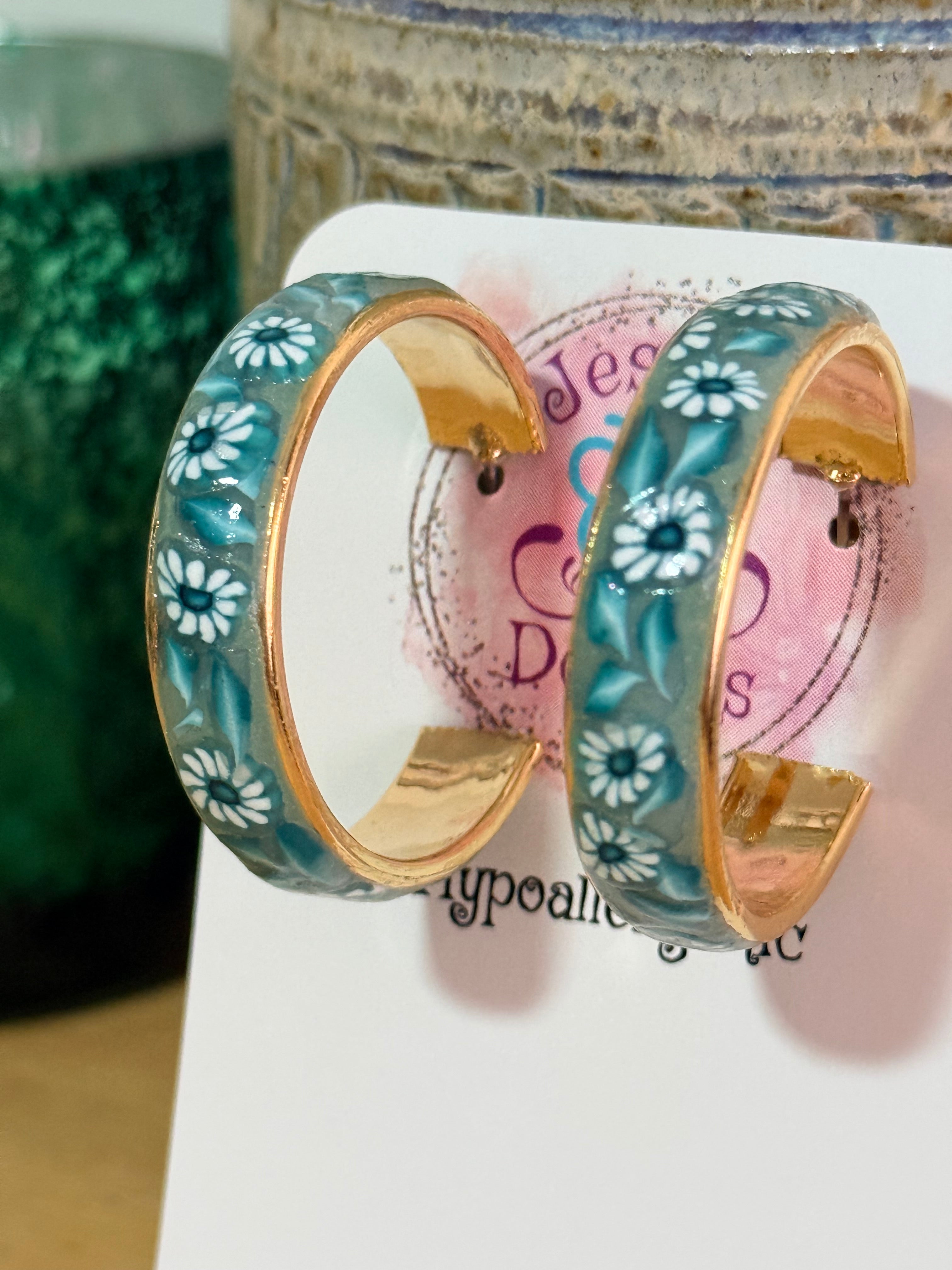 Teal Polymer Clay Daisies & Leaves On Gold Plated Hoop Earrings.