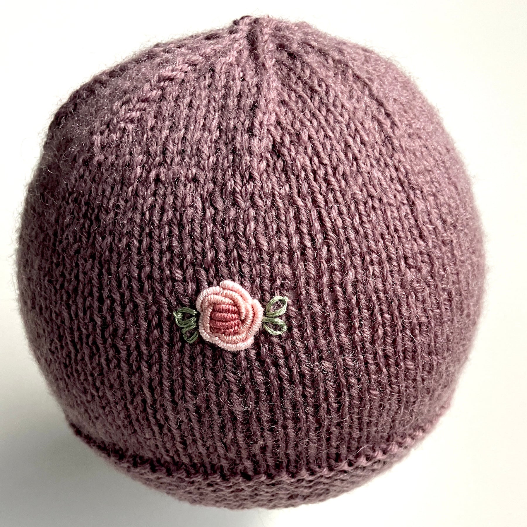 Baby gift set - soft plum with rosebuds - hand-knitted & hand-embroidered