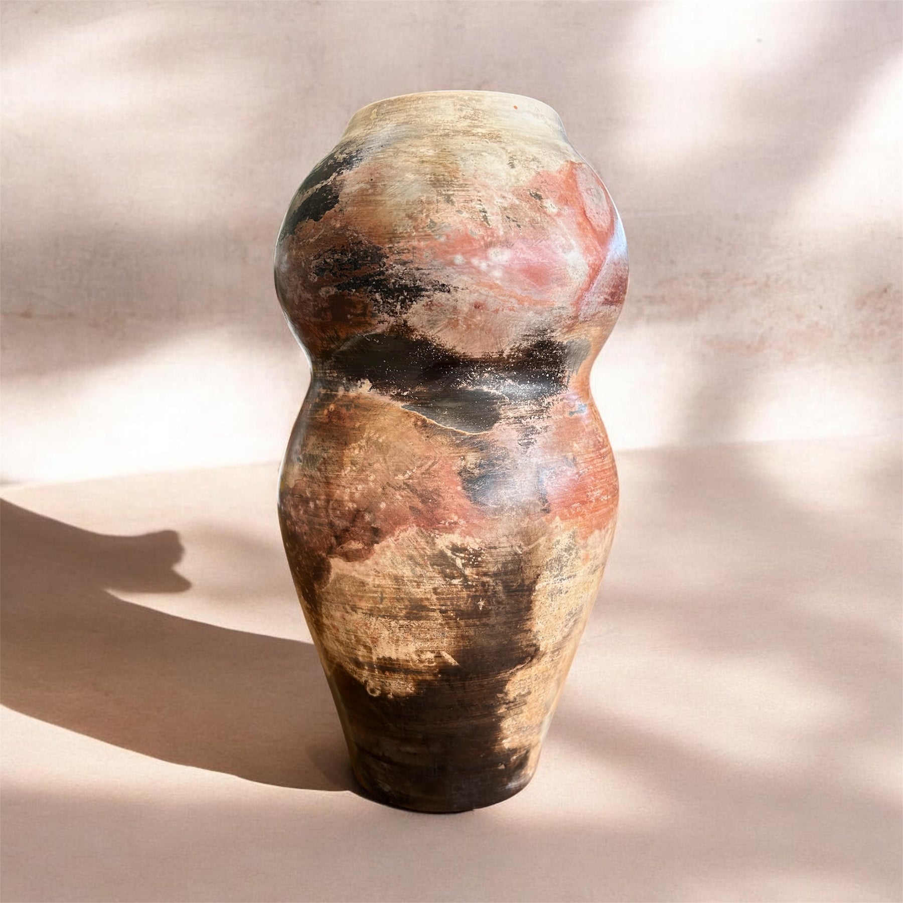 Pit fired pottery feminine form