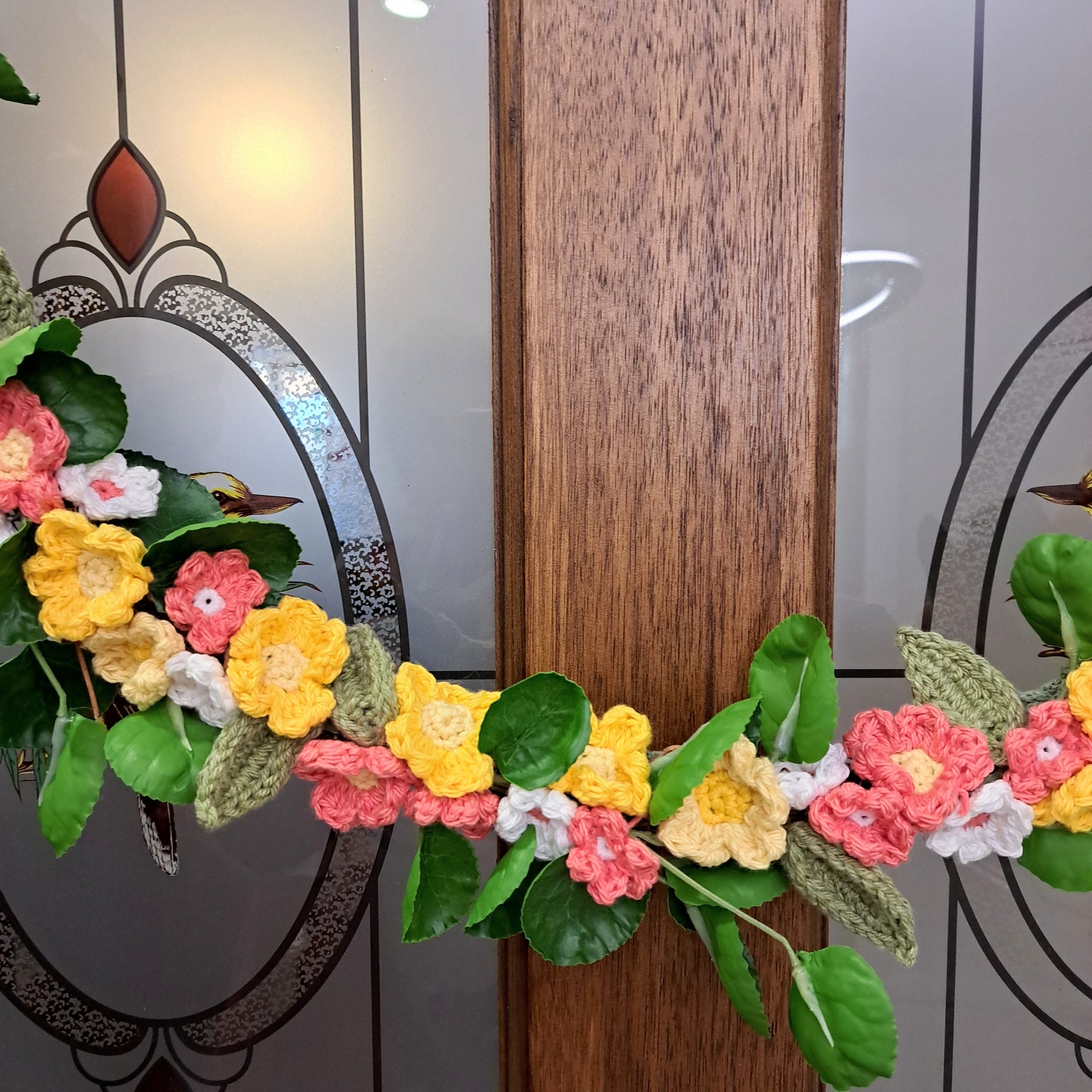 Handmade crochet spring flower wreath, yellows, pinks, white