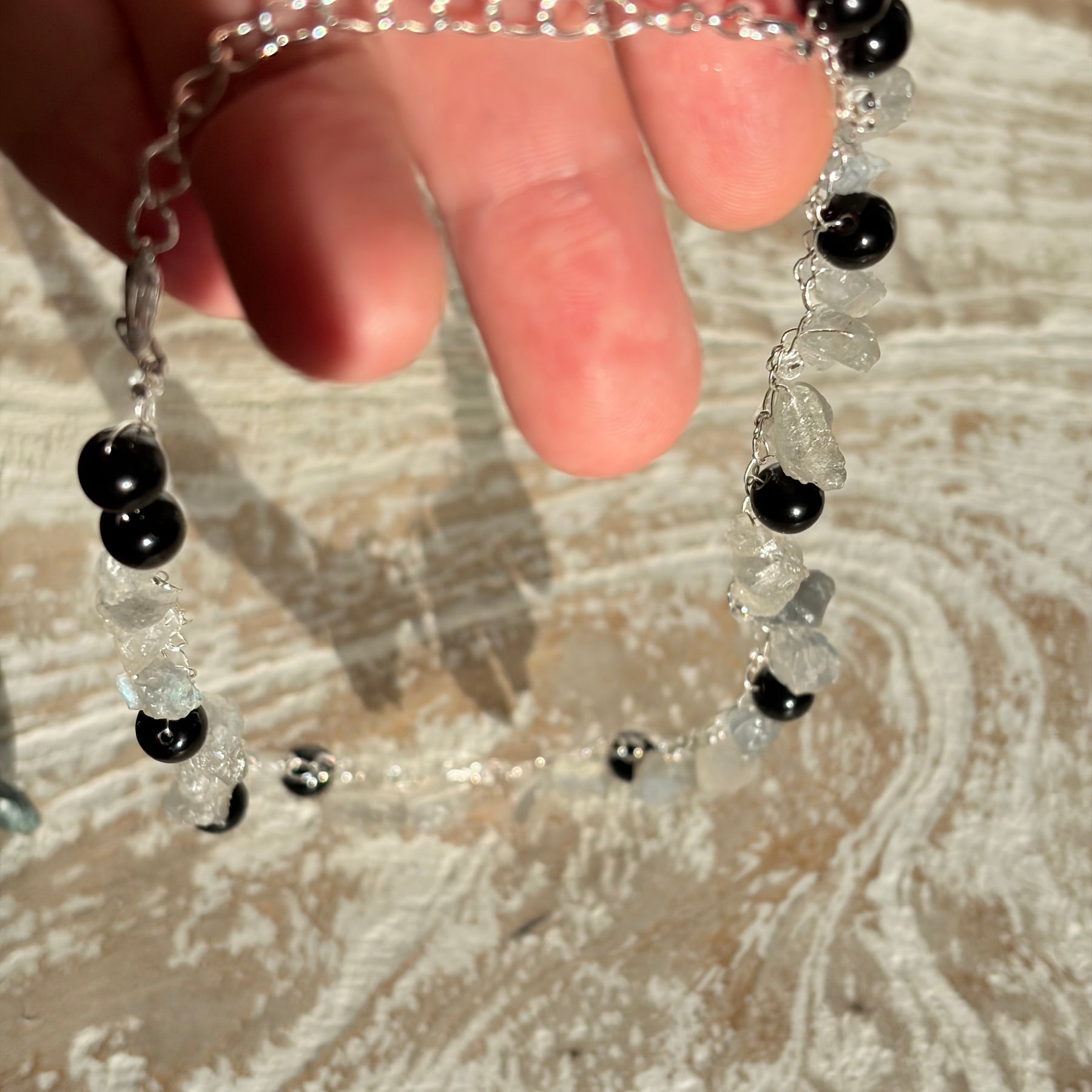 “Smoke” — Labradorite and obsidian crochet necklace