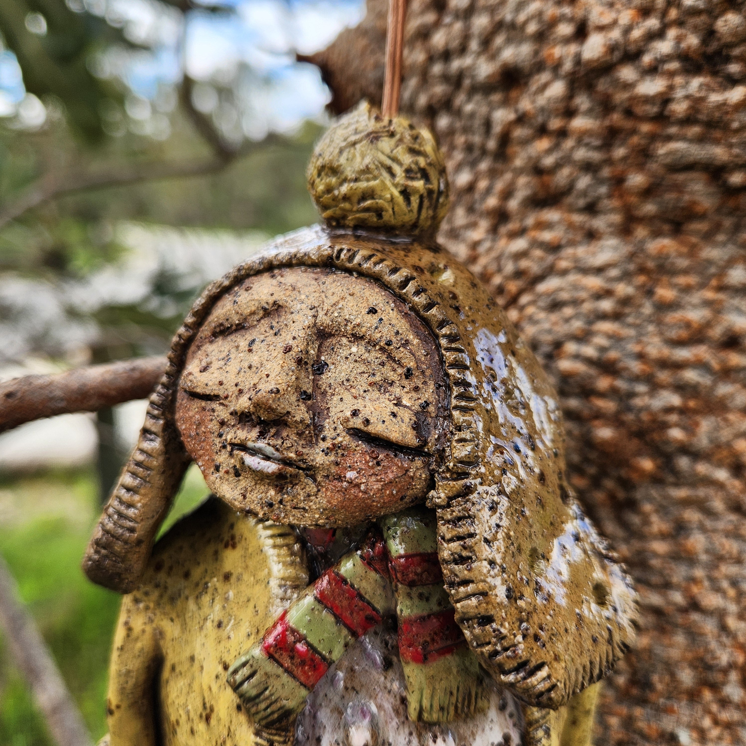 Handmade clay windchime, little girl
