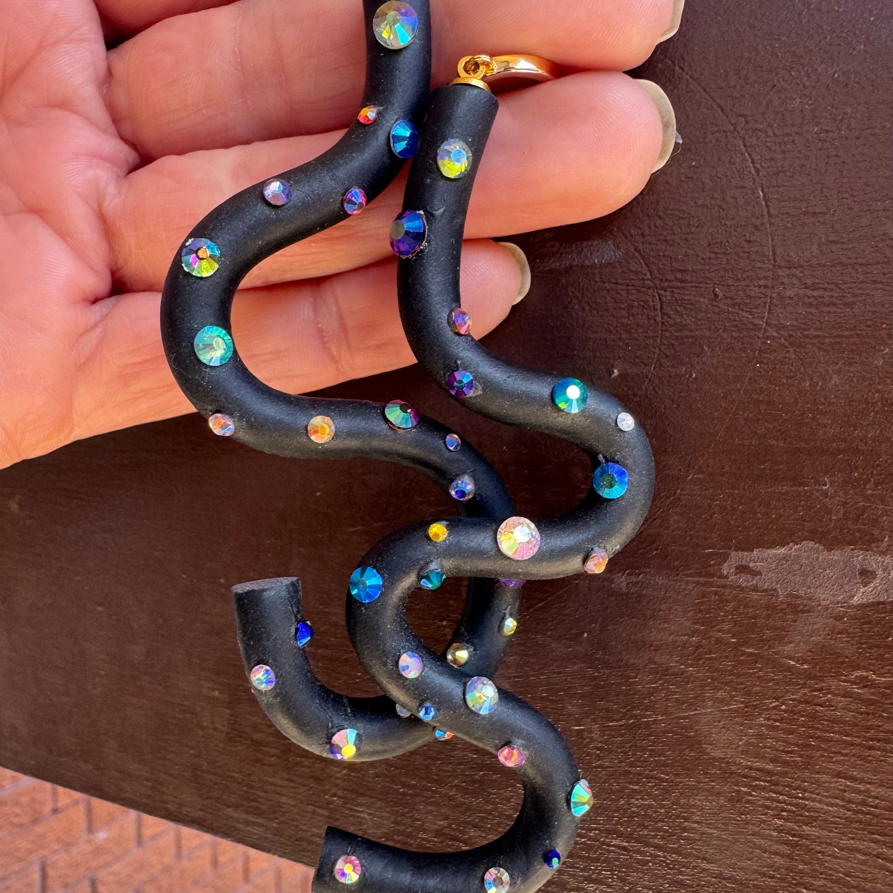 Black squiggle polymer clay earrings with holographic gems