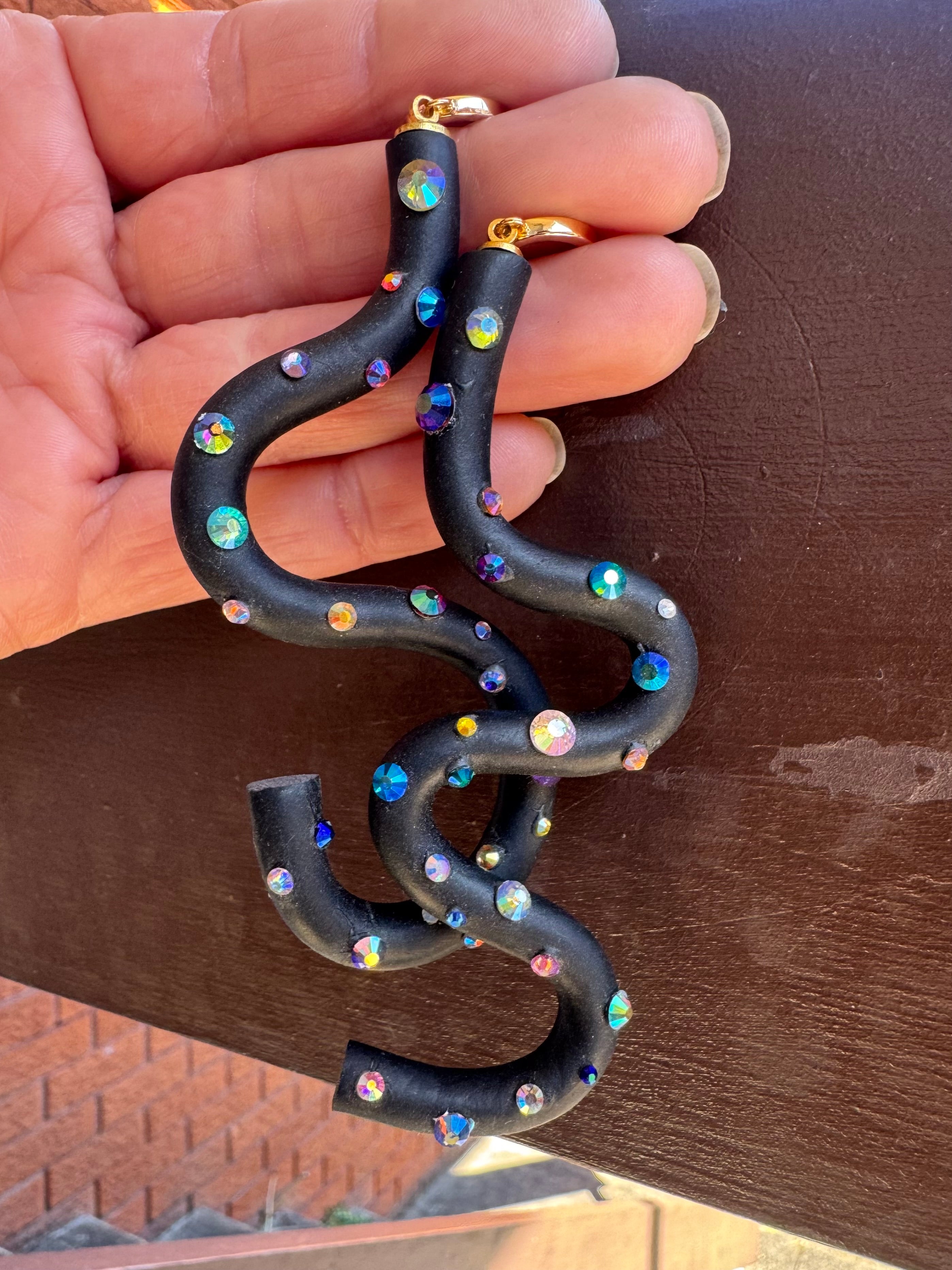 Black squiggle polymer clay earrings with holographic gems
