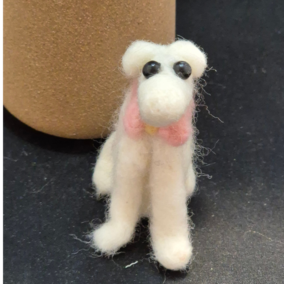 Needle Felted Dog Sitting with Pink Bow