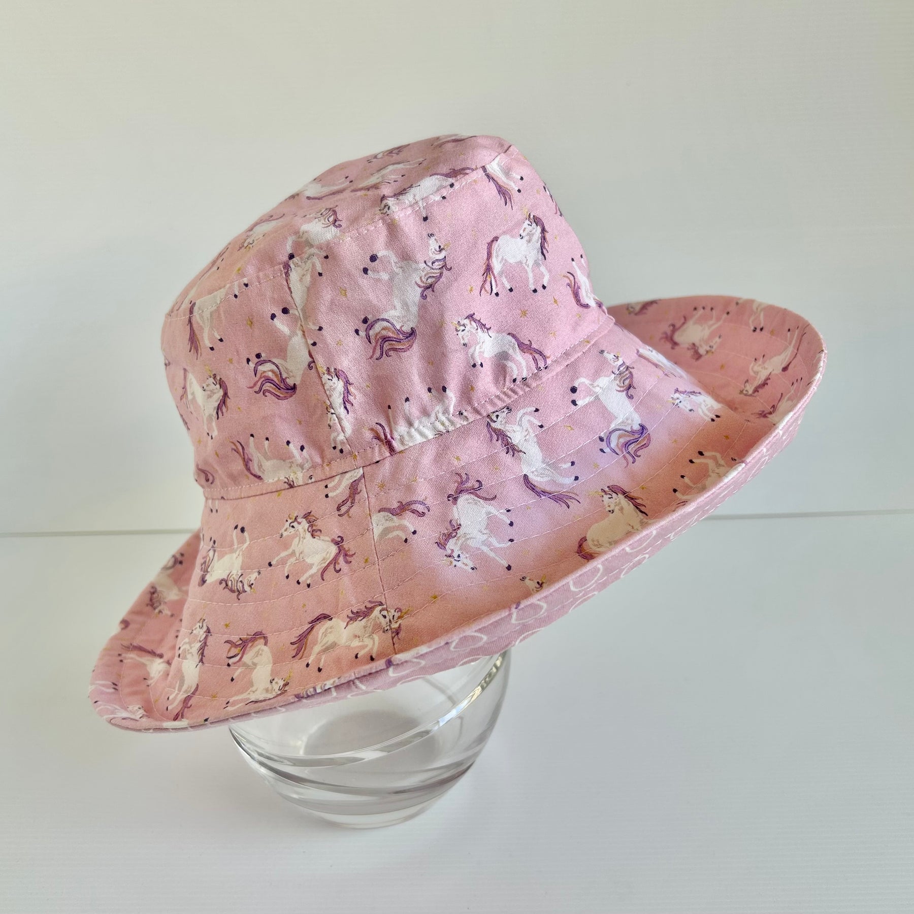 Summer hat in dancing unicorn fabric