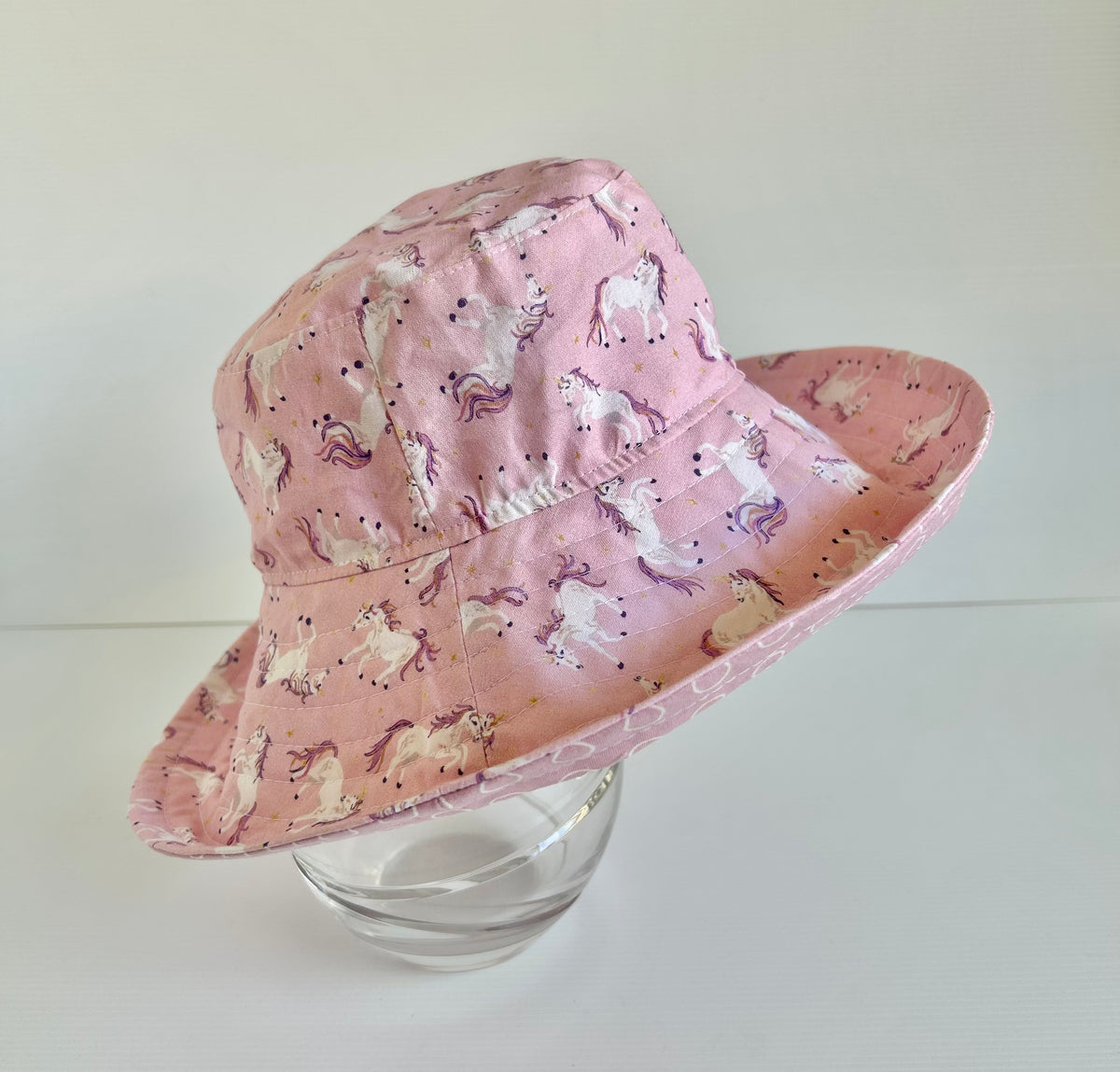 Summer hat in dancing unicorn fabric