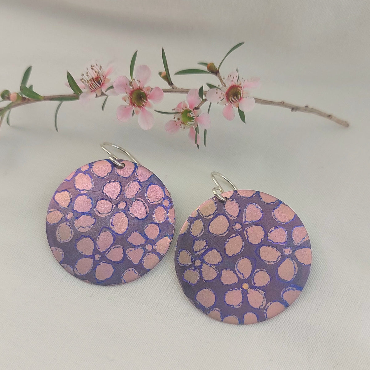 Titanium Disc Earrings with Leptospermum Design- purple, pink, blue