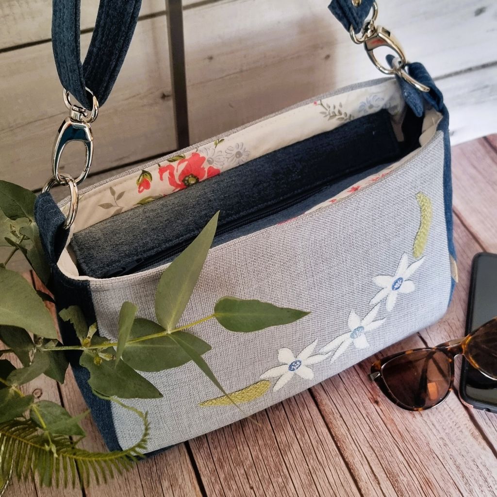Handmade appliqued crossbody zip bag - blue with flannel flowers