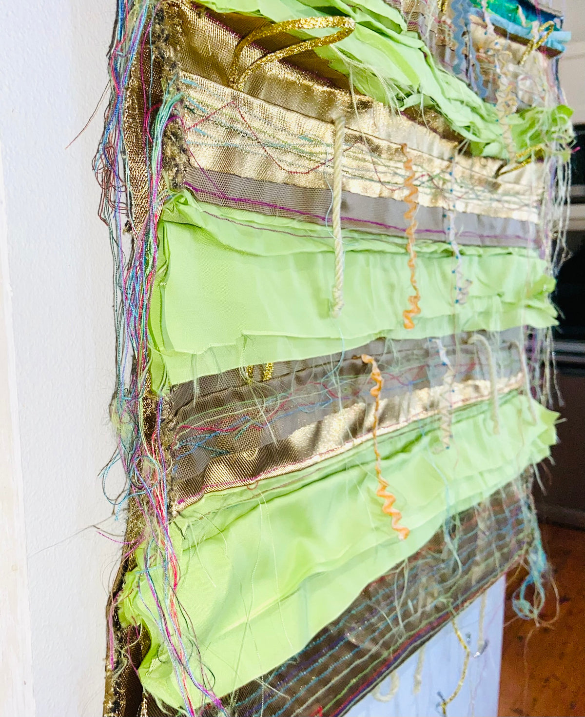 Green, Blue and Gold textile wall hanging