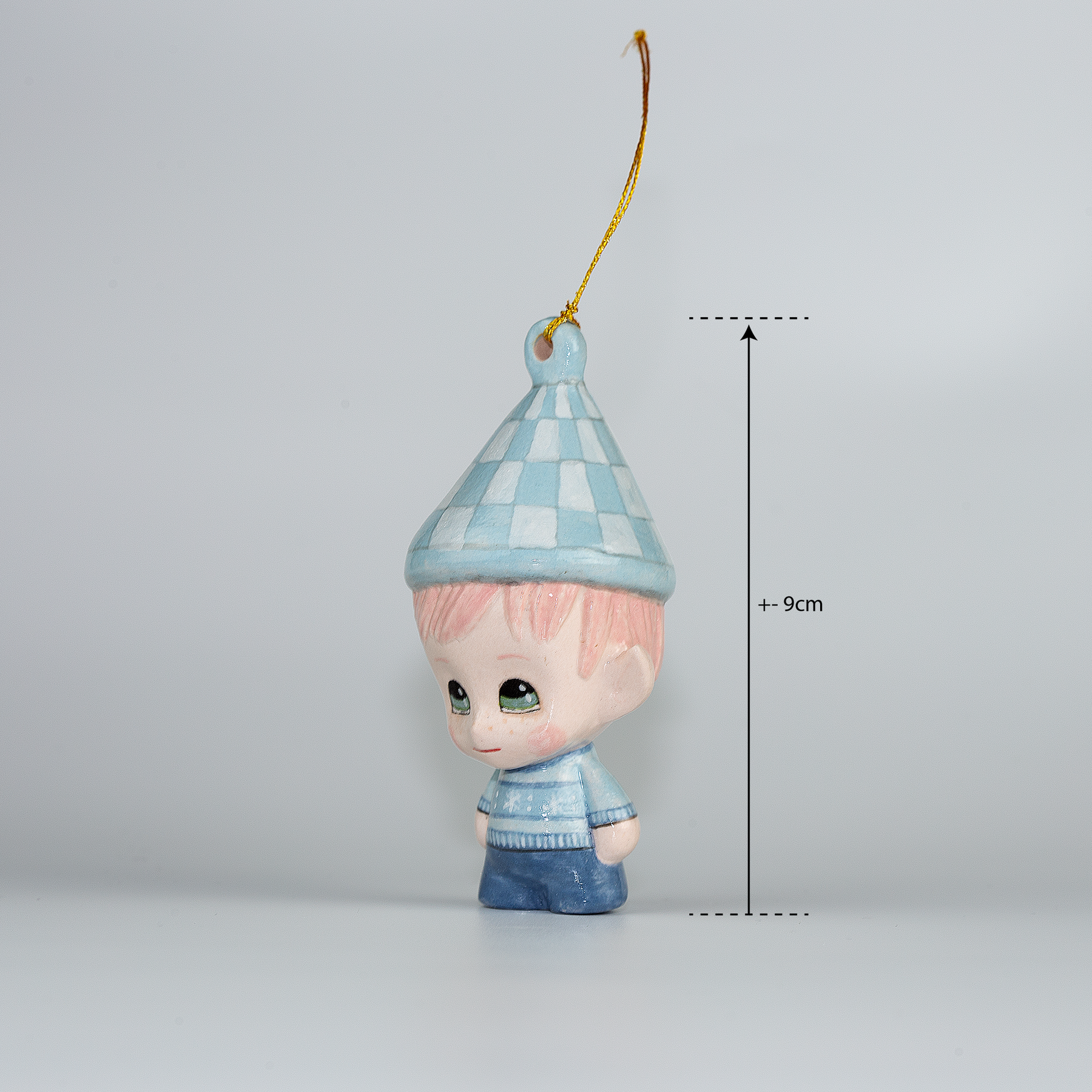 Handmade Porcelain Christmas ornament. One-of-a-kind. Sally, the Christmas Sweater designer Elf.